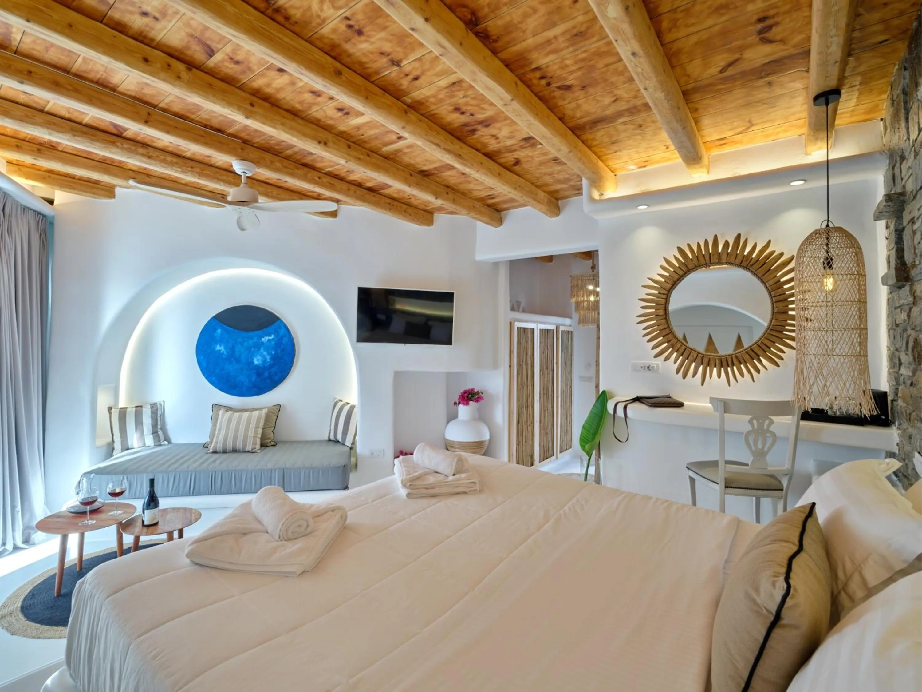 Bed in Zefi Hotel & Suites