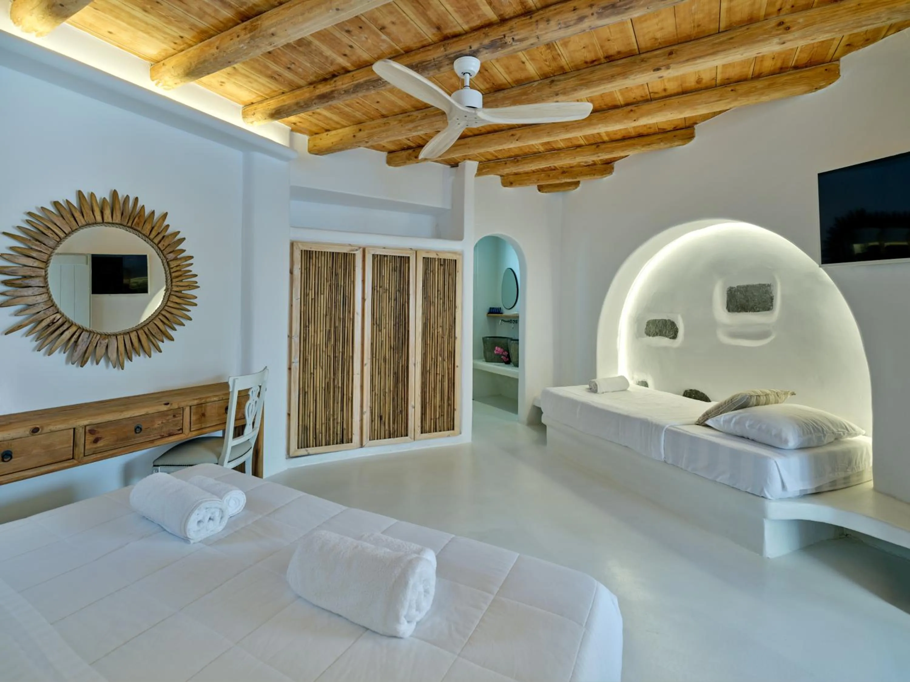 Bed in Zefi Hotel & Suites