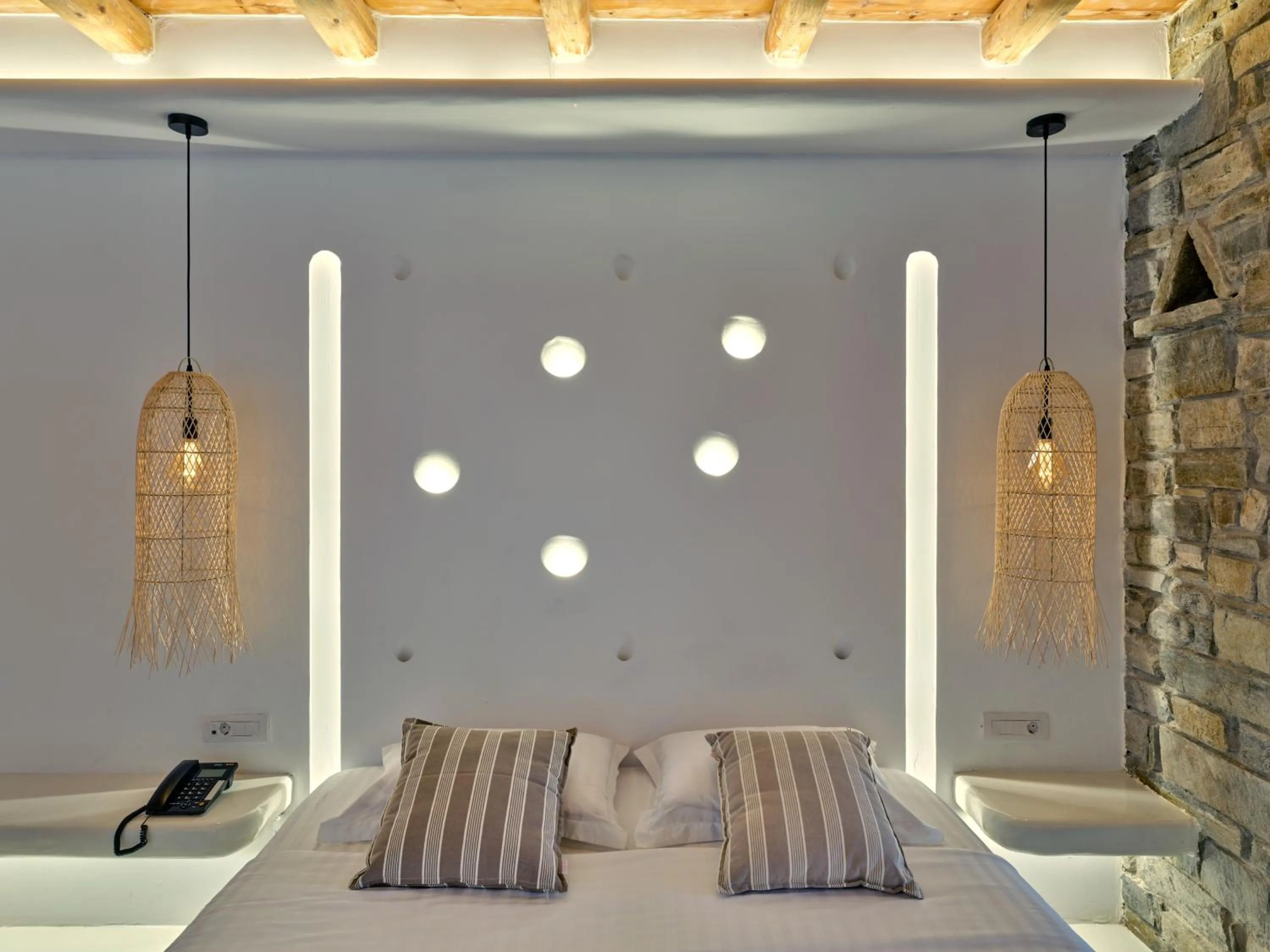 Bed in Zefi Hotel & Suites