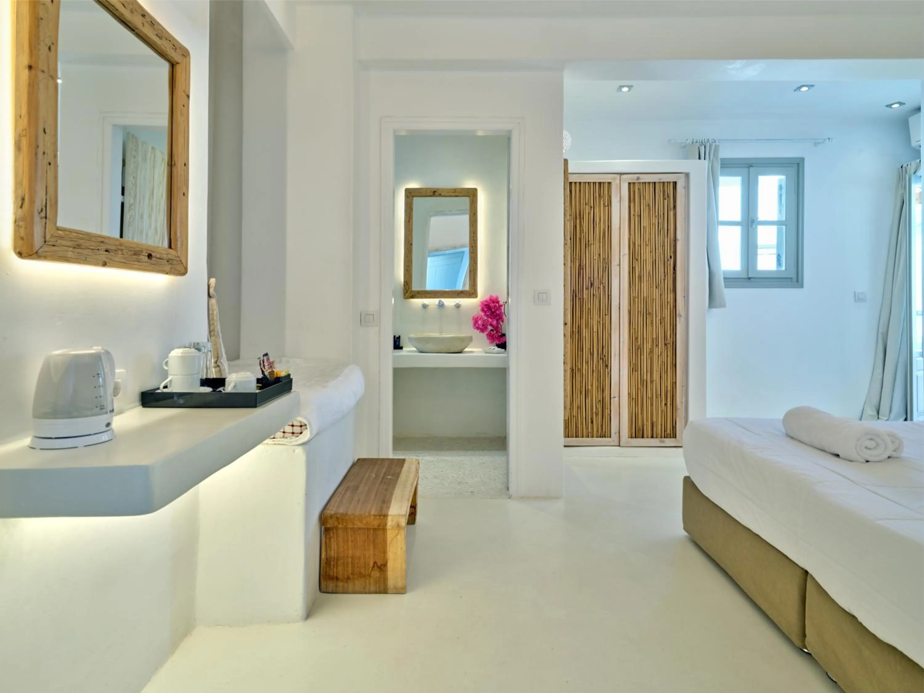 Bed in Zefi Hotel & Suites