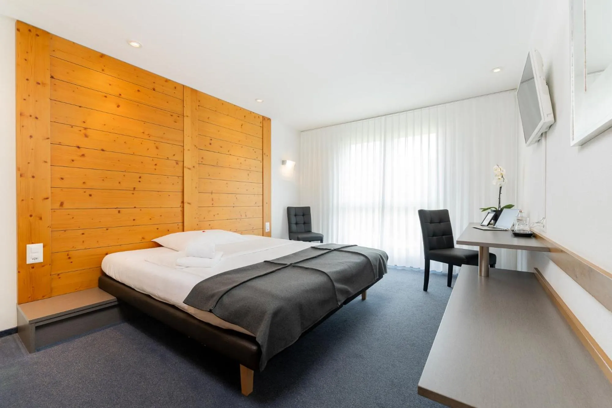 Bed in Swiss Heidi Hotel