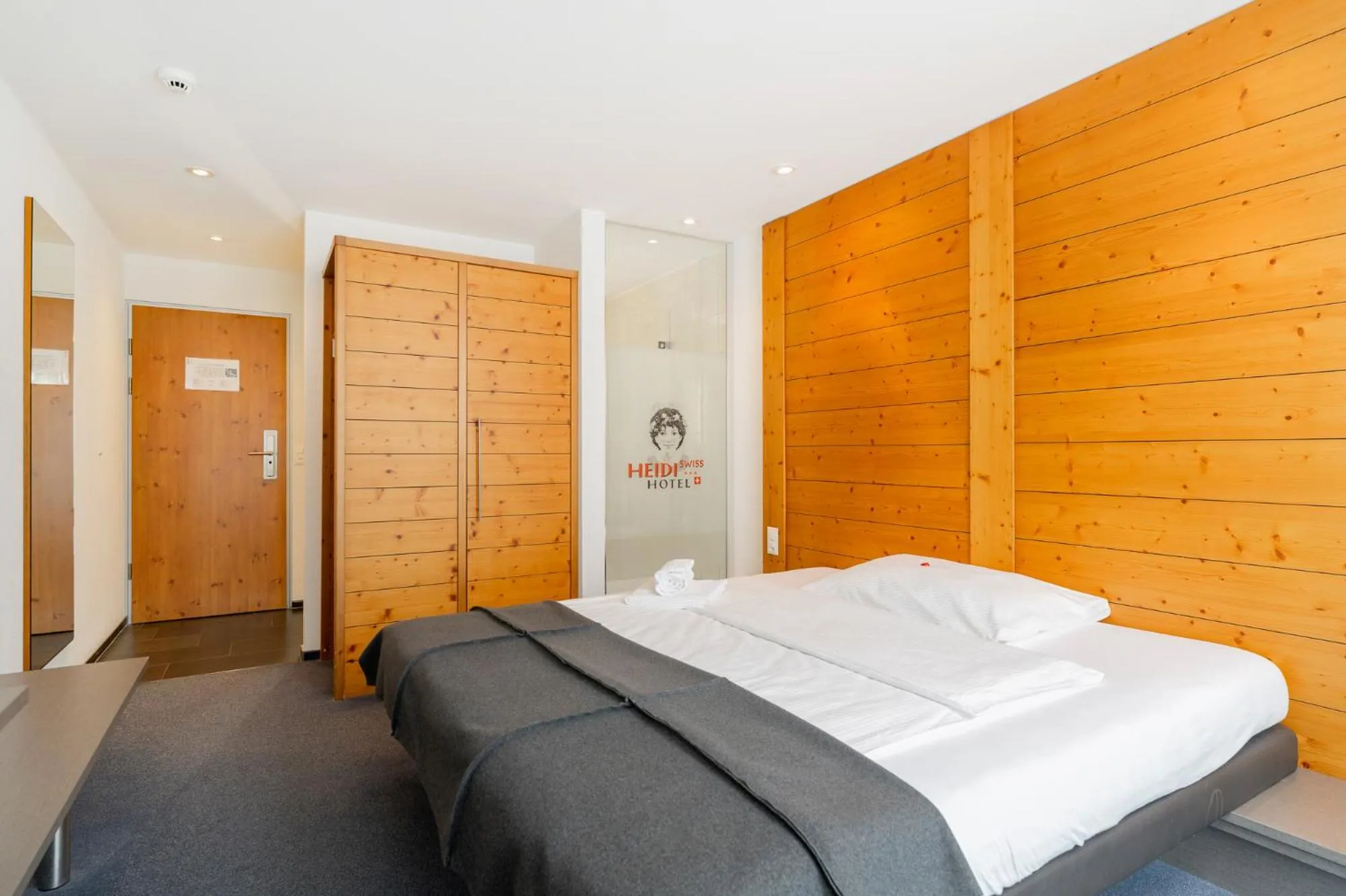 Bed in Swiss Heidi Hotel