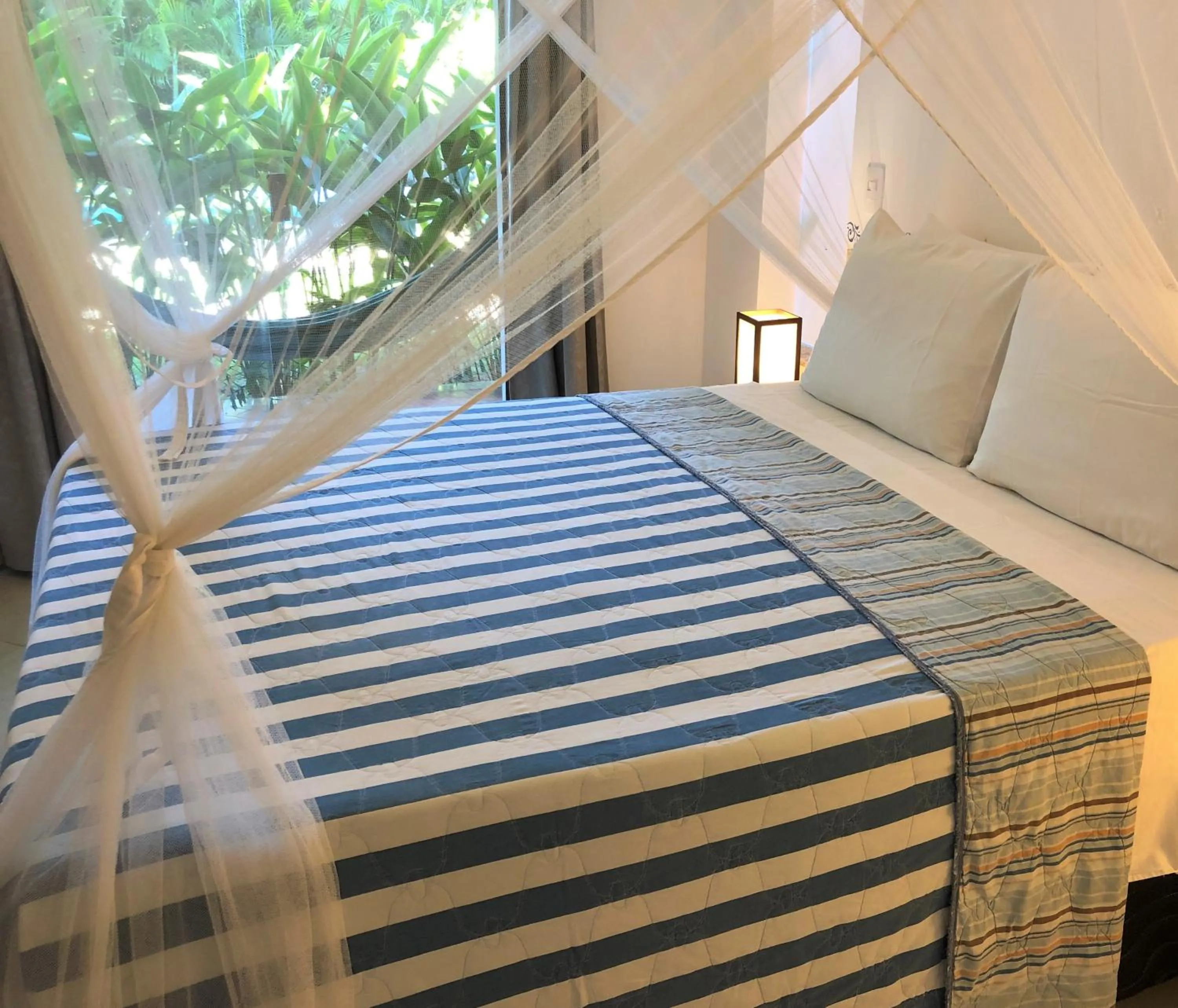 Bed in Ouro Sobre Azul Apart Hotel