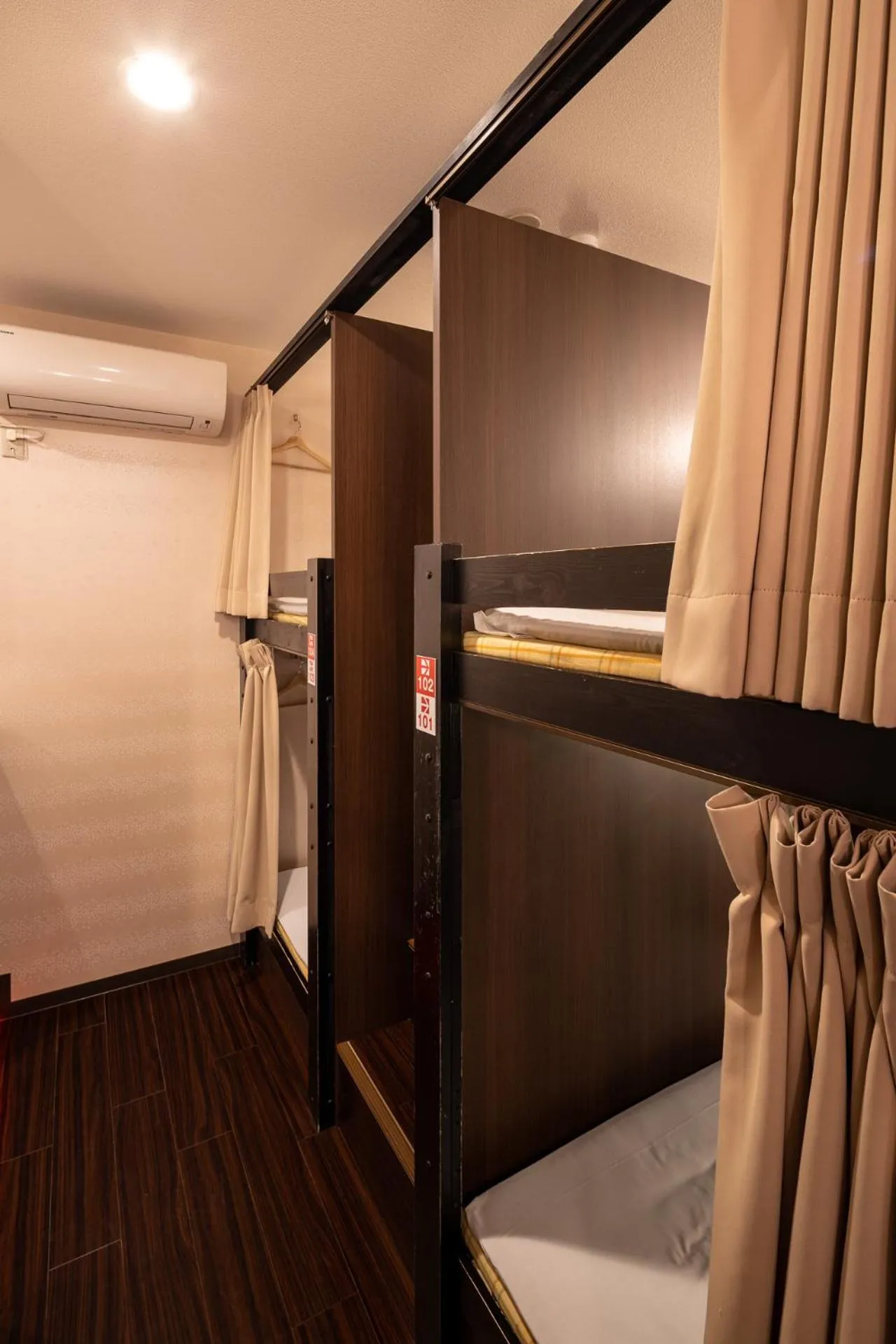 Bed in Hotel Owl Tokyo Nippori