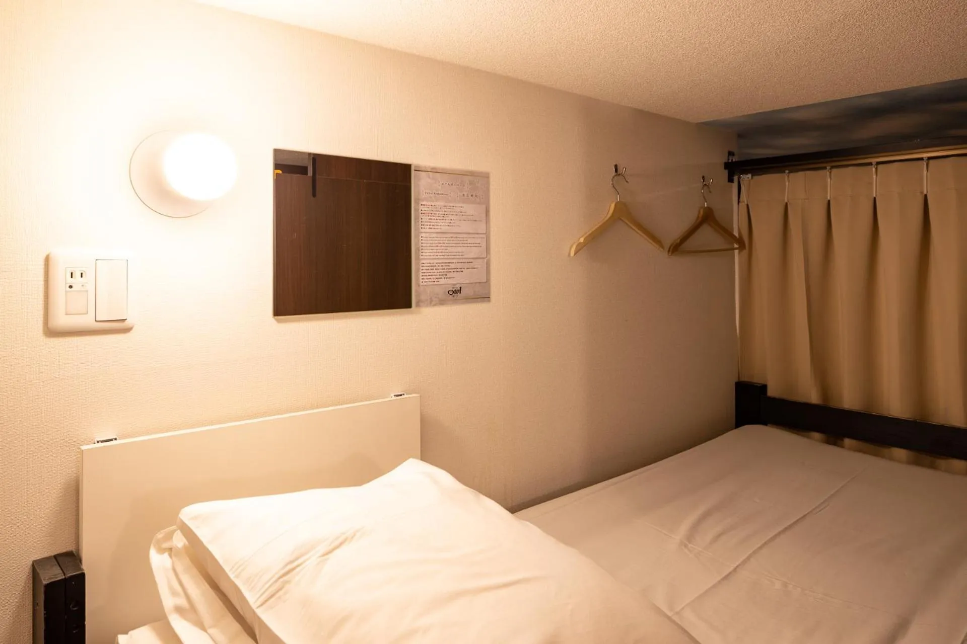 Bed in Hotel Owl Tokyo Nippori