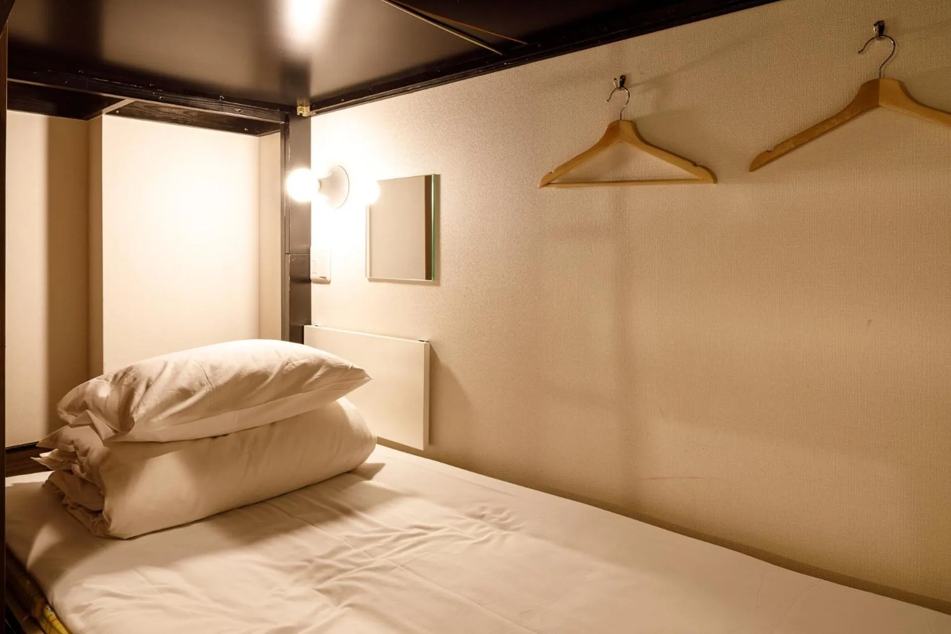 Bed in Hotel Owl Tokyo Nippori