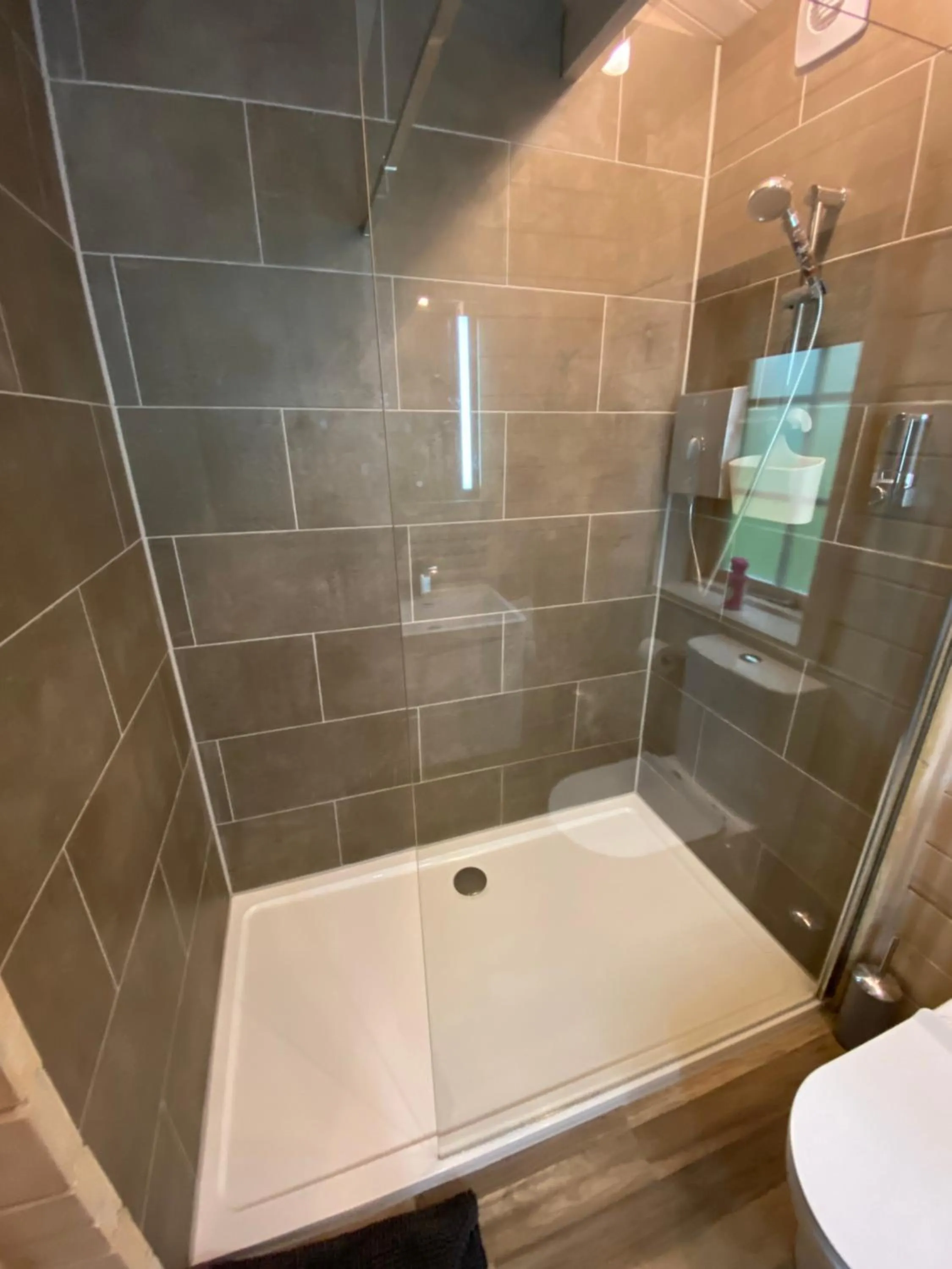 Shower in The Secret Cottage & Hideaway Caravan