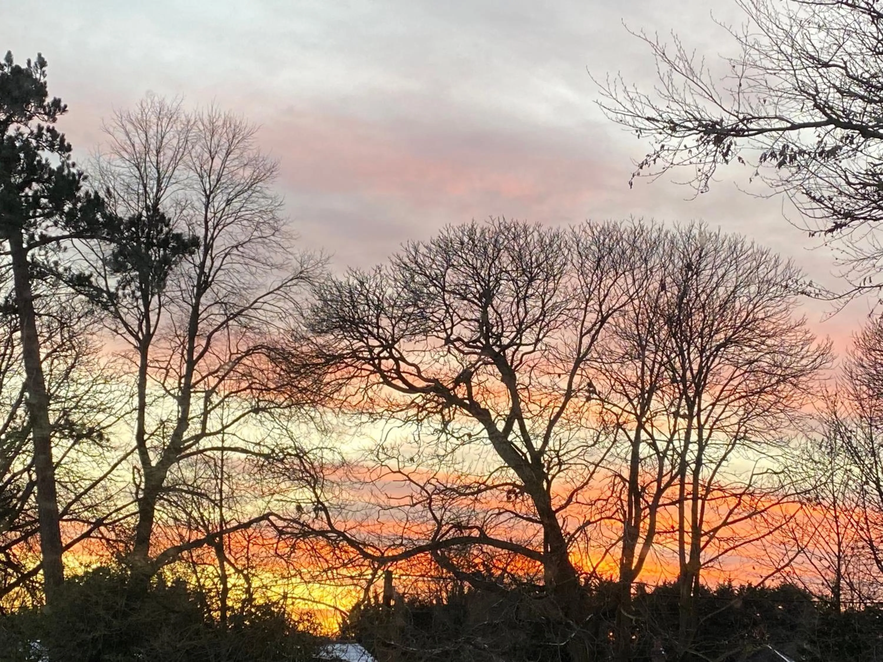 Sunset in The Secret Cottage & Hideaway Caravan