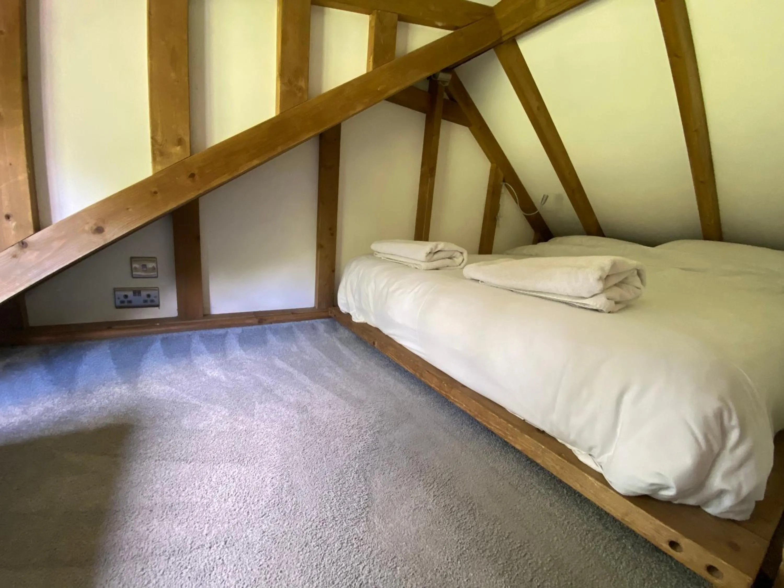 Bedroom in The Secret Cottage & Hideaway Caravan