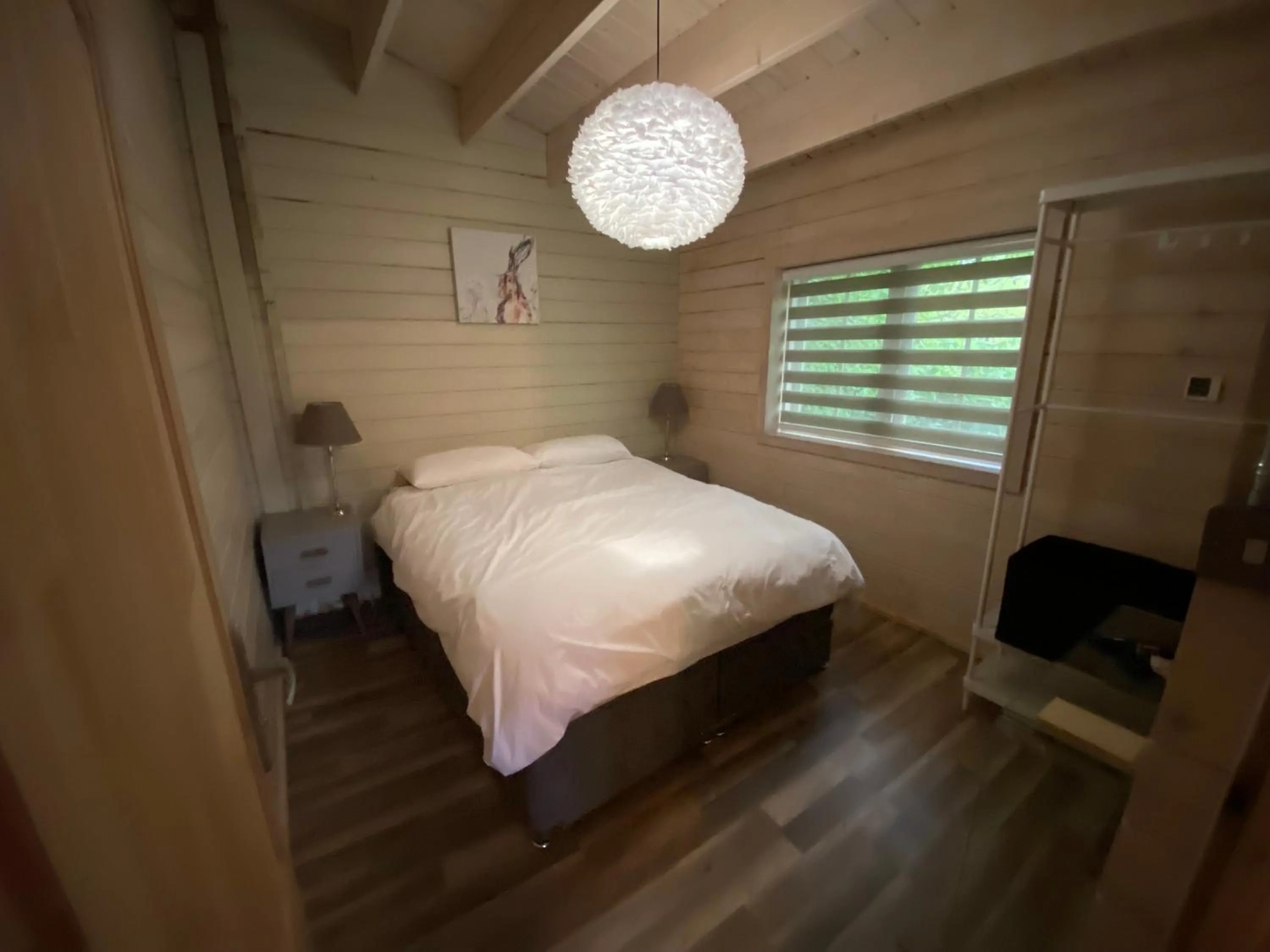 Bedroom in The Secret Cottage & Hideaway Caravan