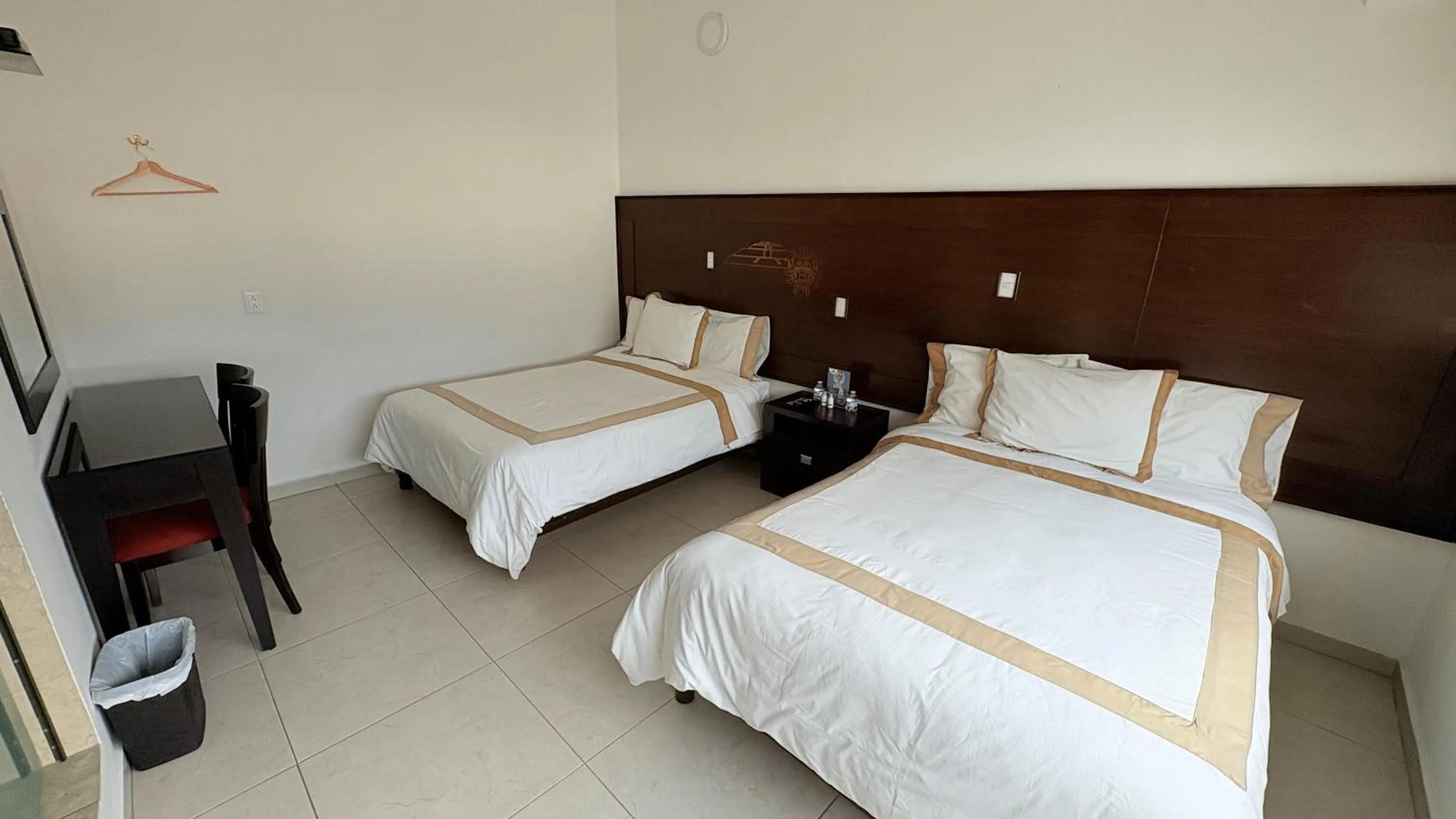 Bed in Hotel Boutique Yaocalli