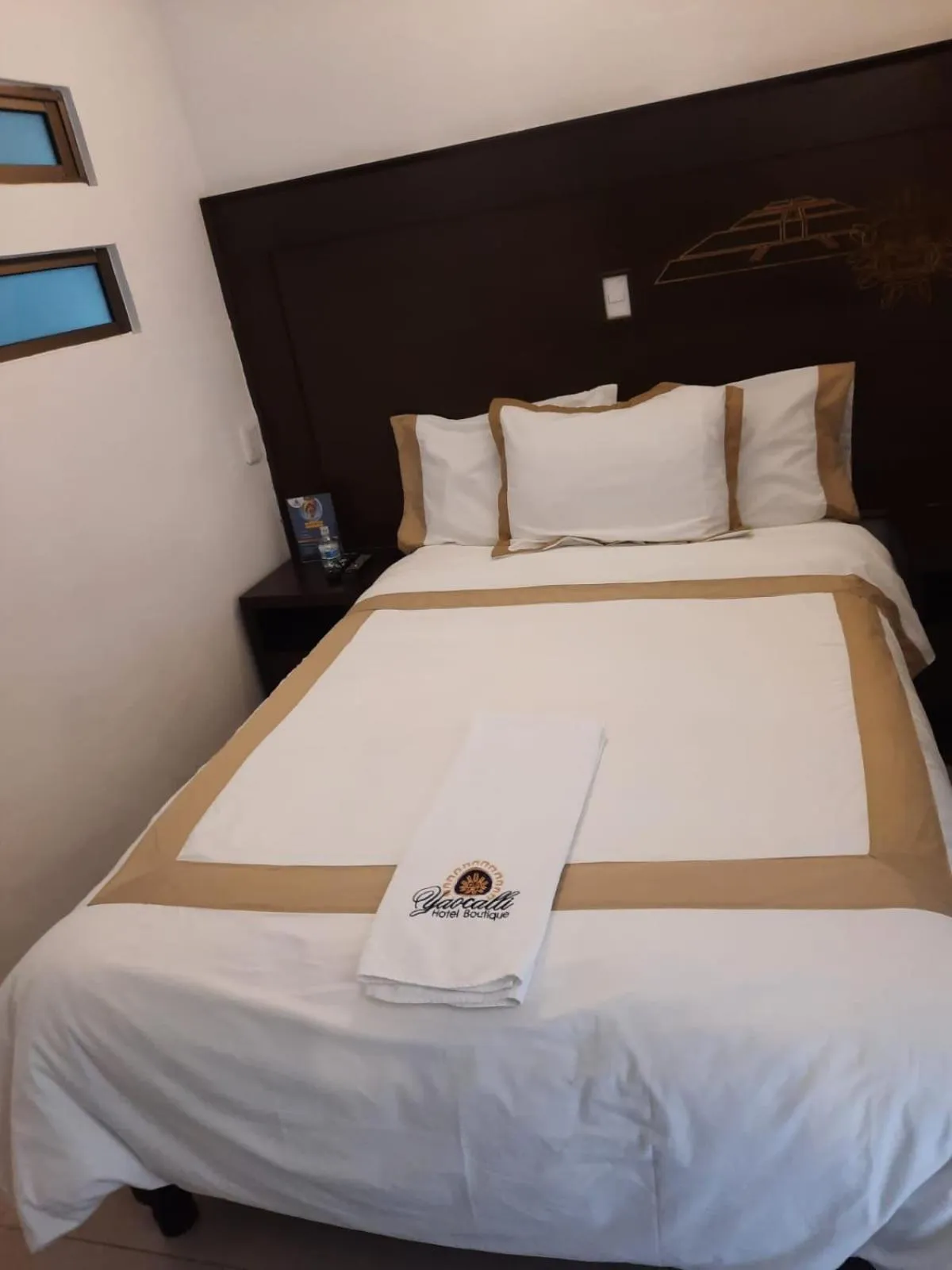 Bed in Hotel Boutique Yaocalli