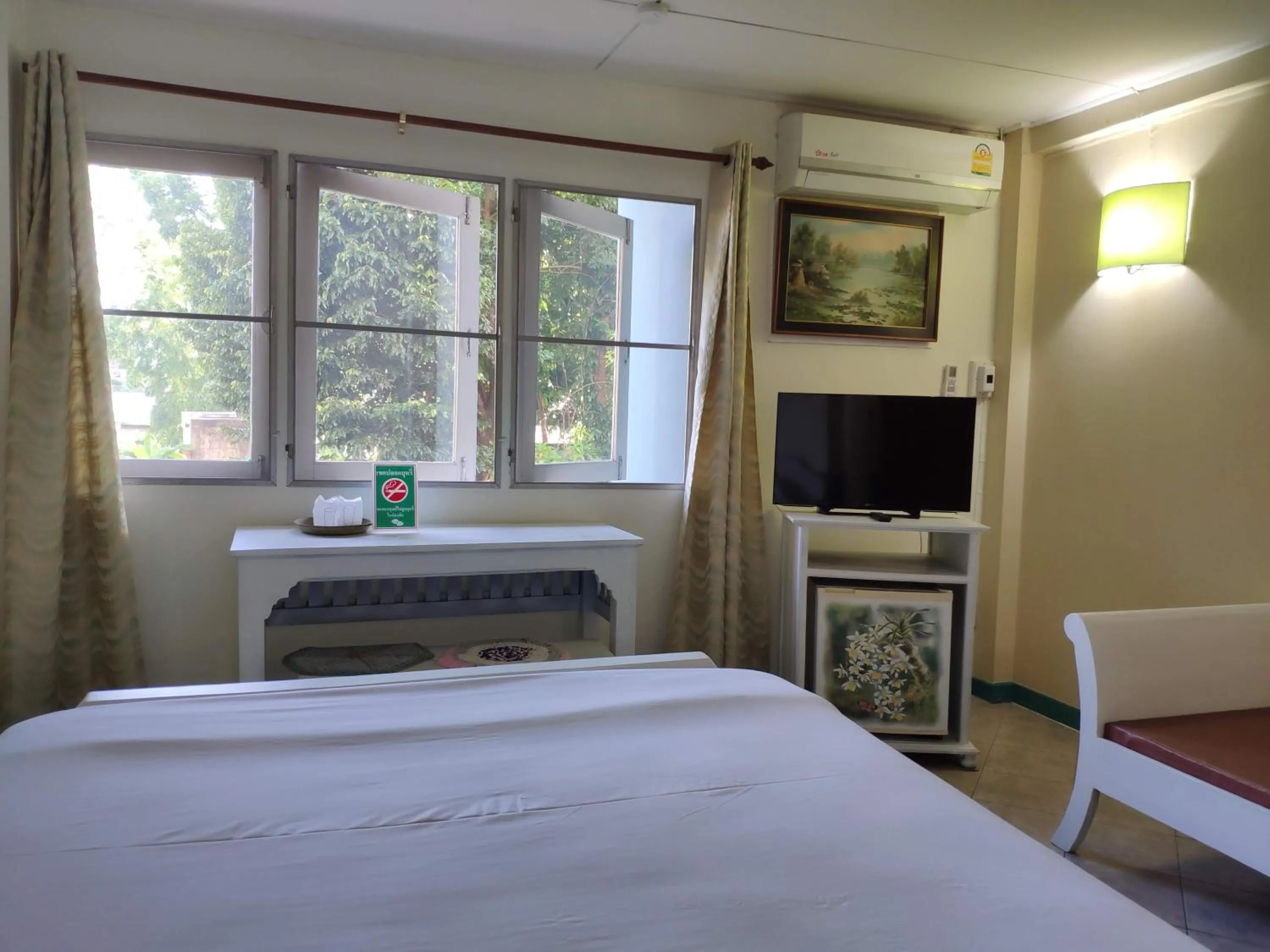 Bed in Changpuak Hotel