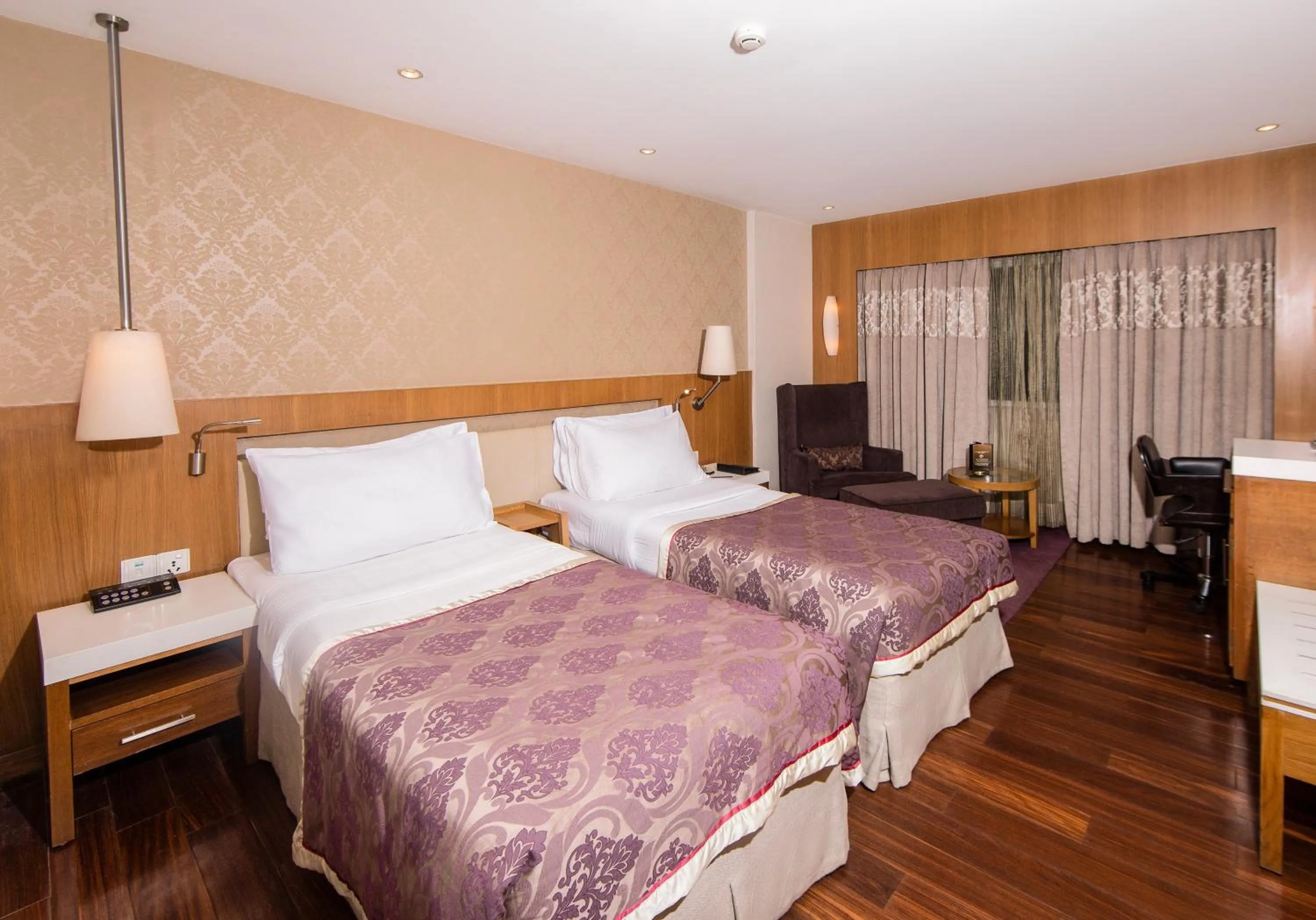 Bed in Hotel Bawa International