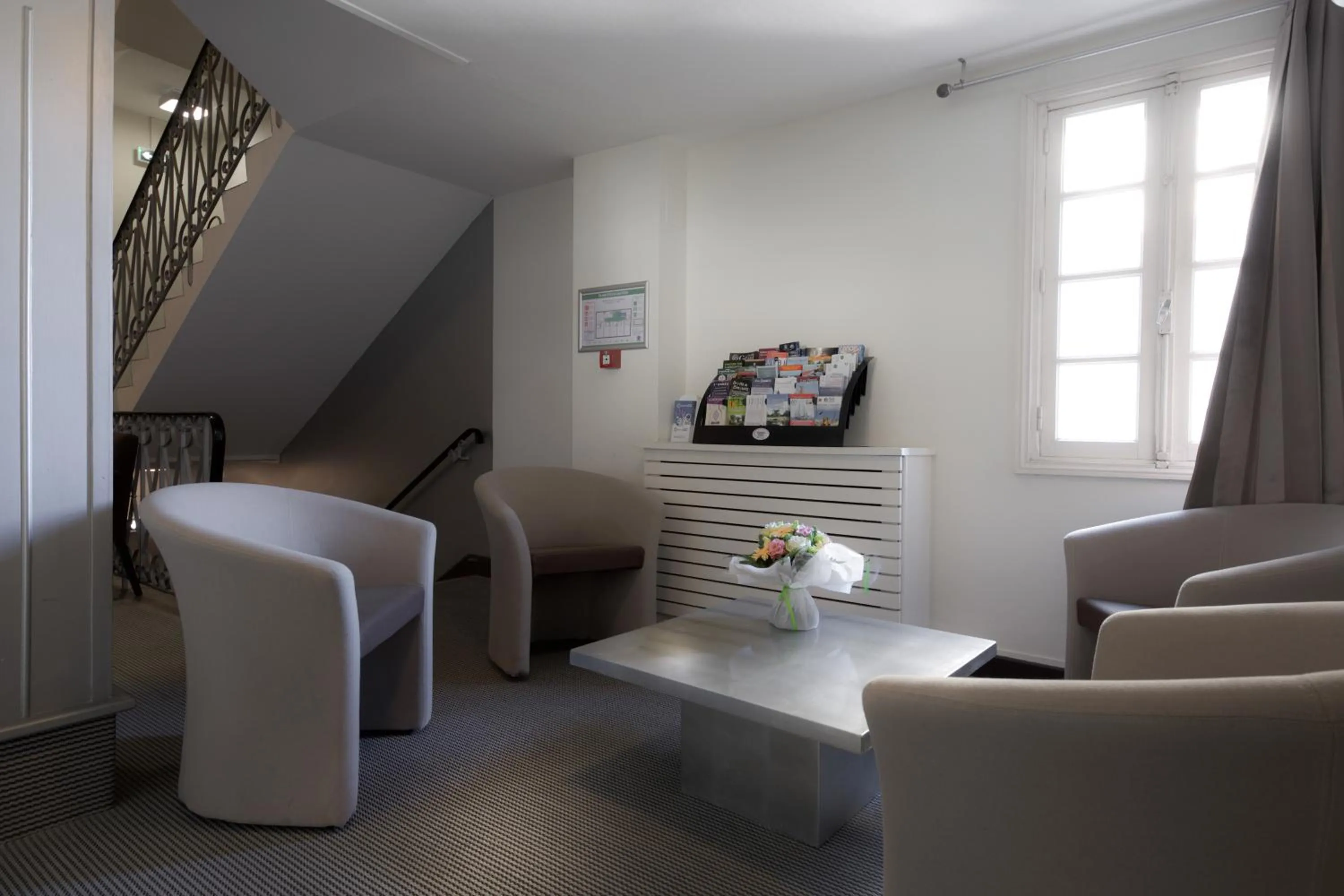 Seating area in Hotel Restaurant du Centre et du Lauragais