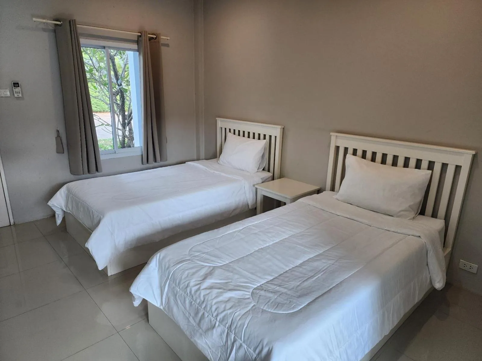 Bed in Vanilla Ville Resort