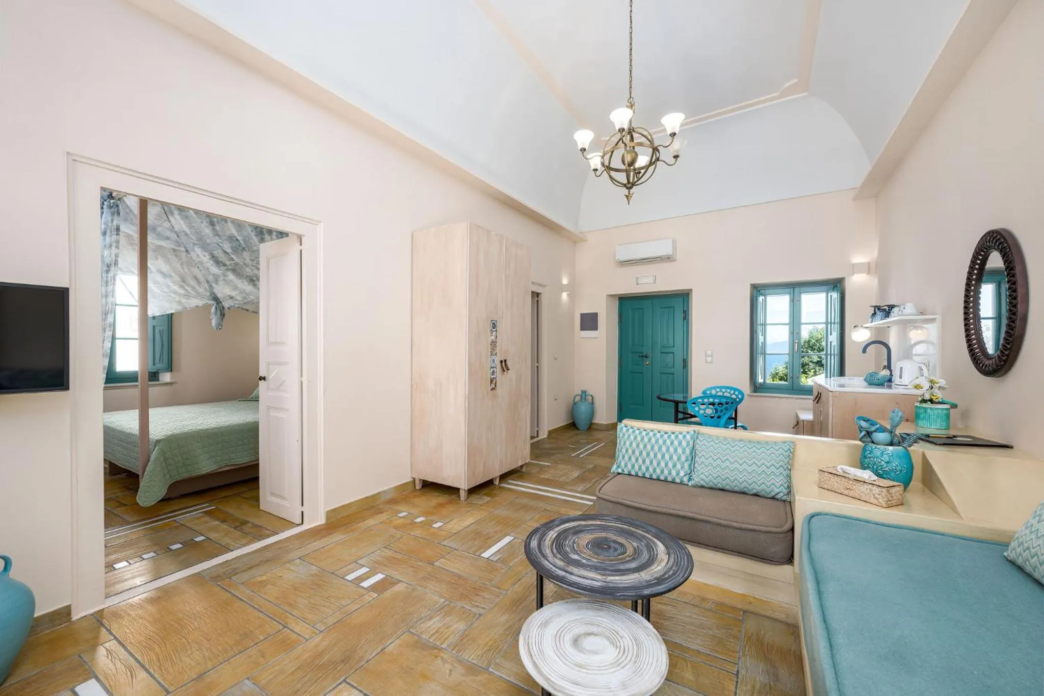 Communal lounge/ TV room, Bed in Passion Blue Villas