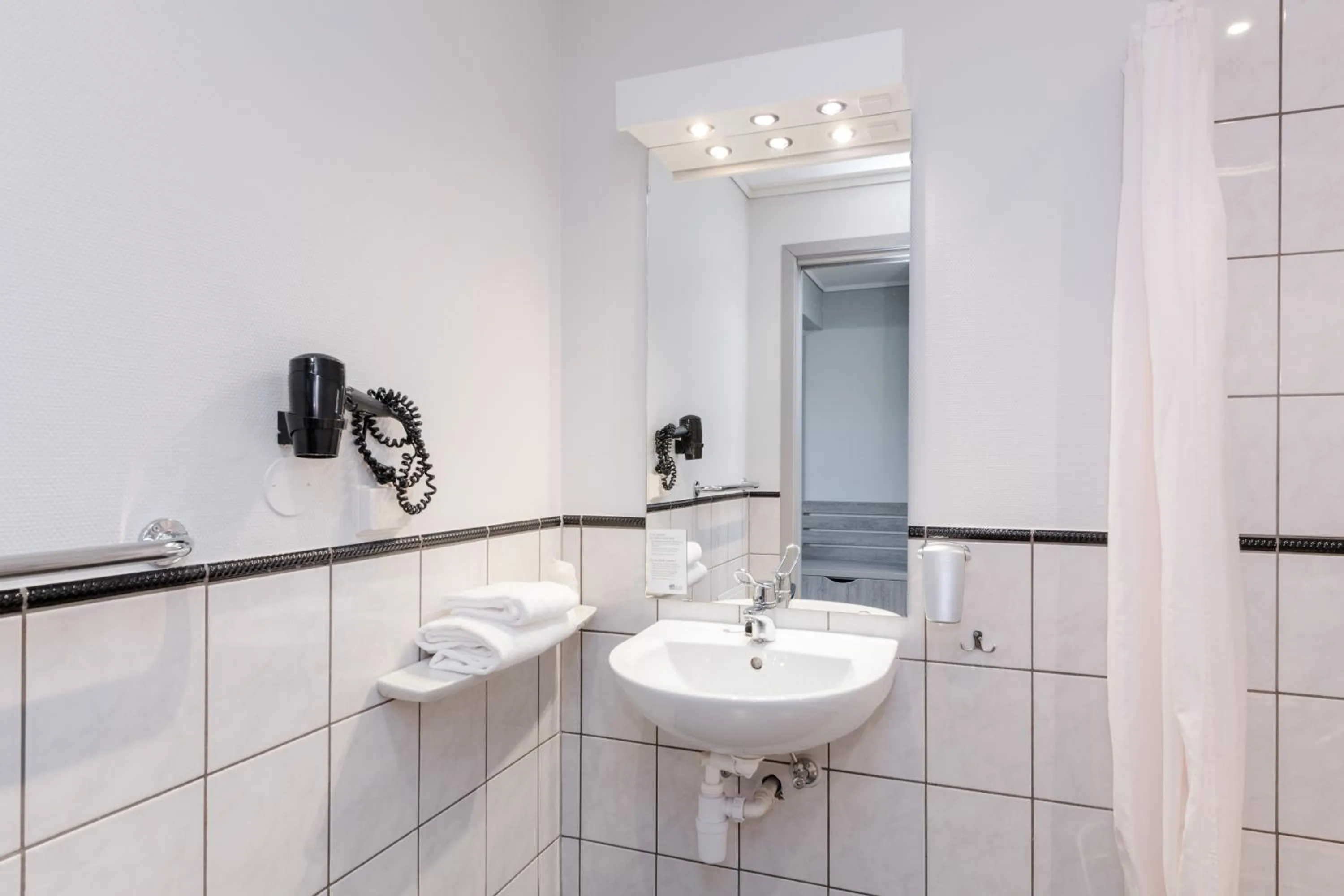 Bathroom in Grand Hotel Egersund