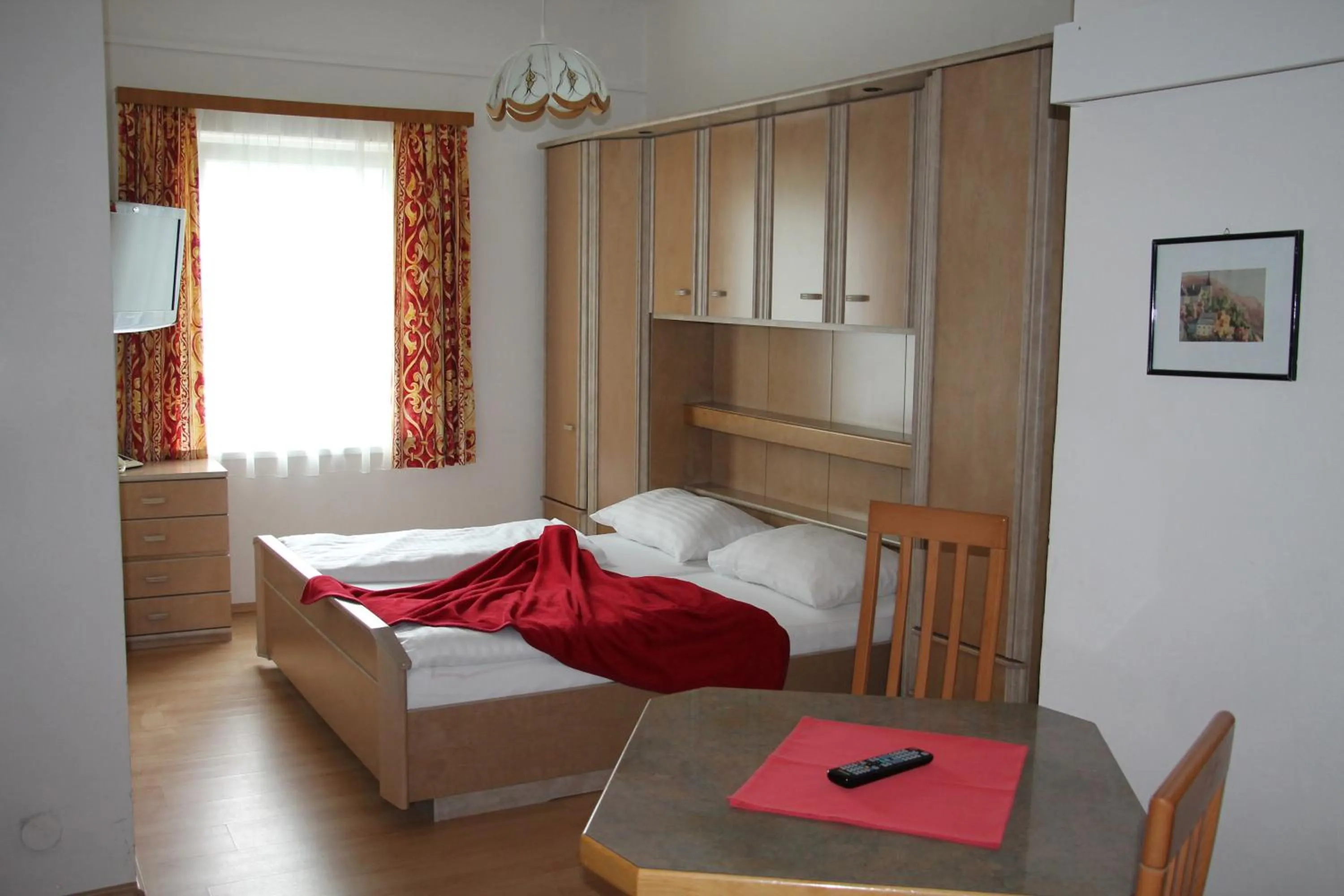 Bedroom in Strandhotel Pichler