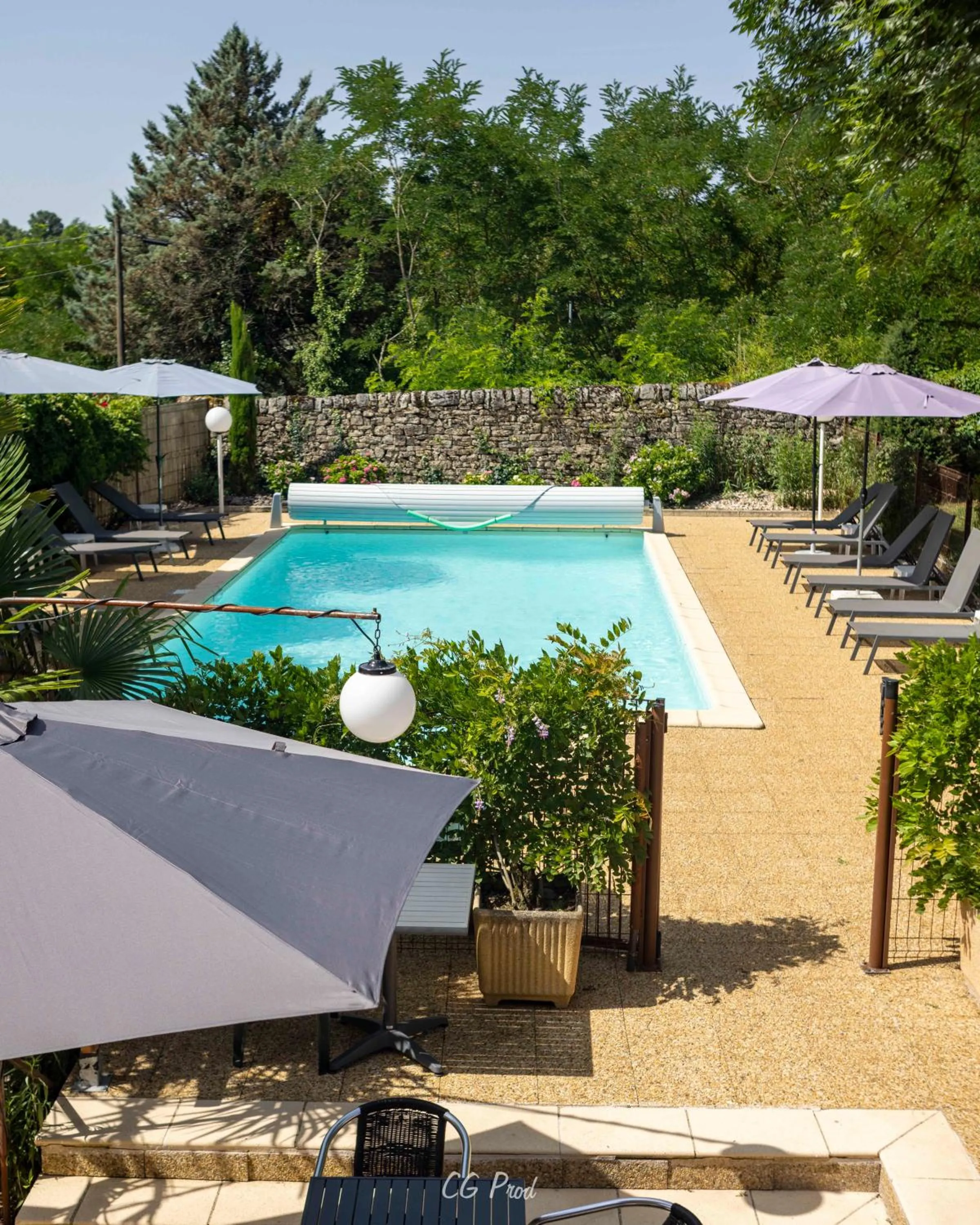 Swimming pool in Hôtel Restaurant Le Relais des Gourmands