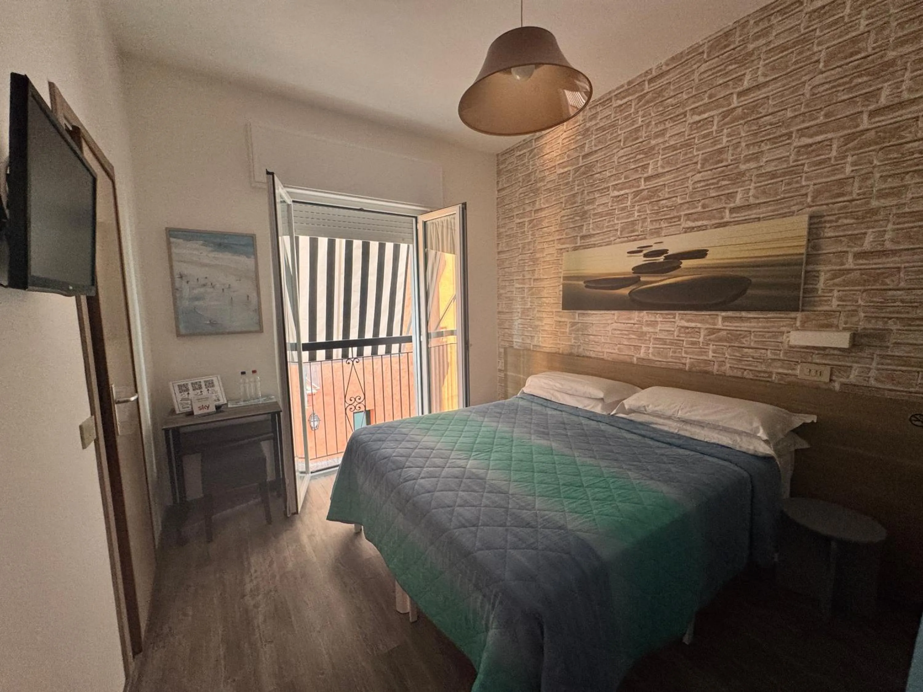 Photo of the whole room, Bed in Regina Urban Beach Hotel