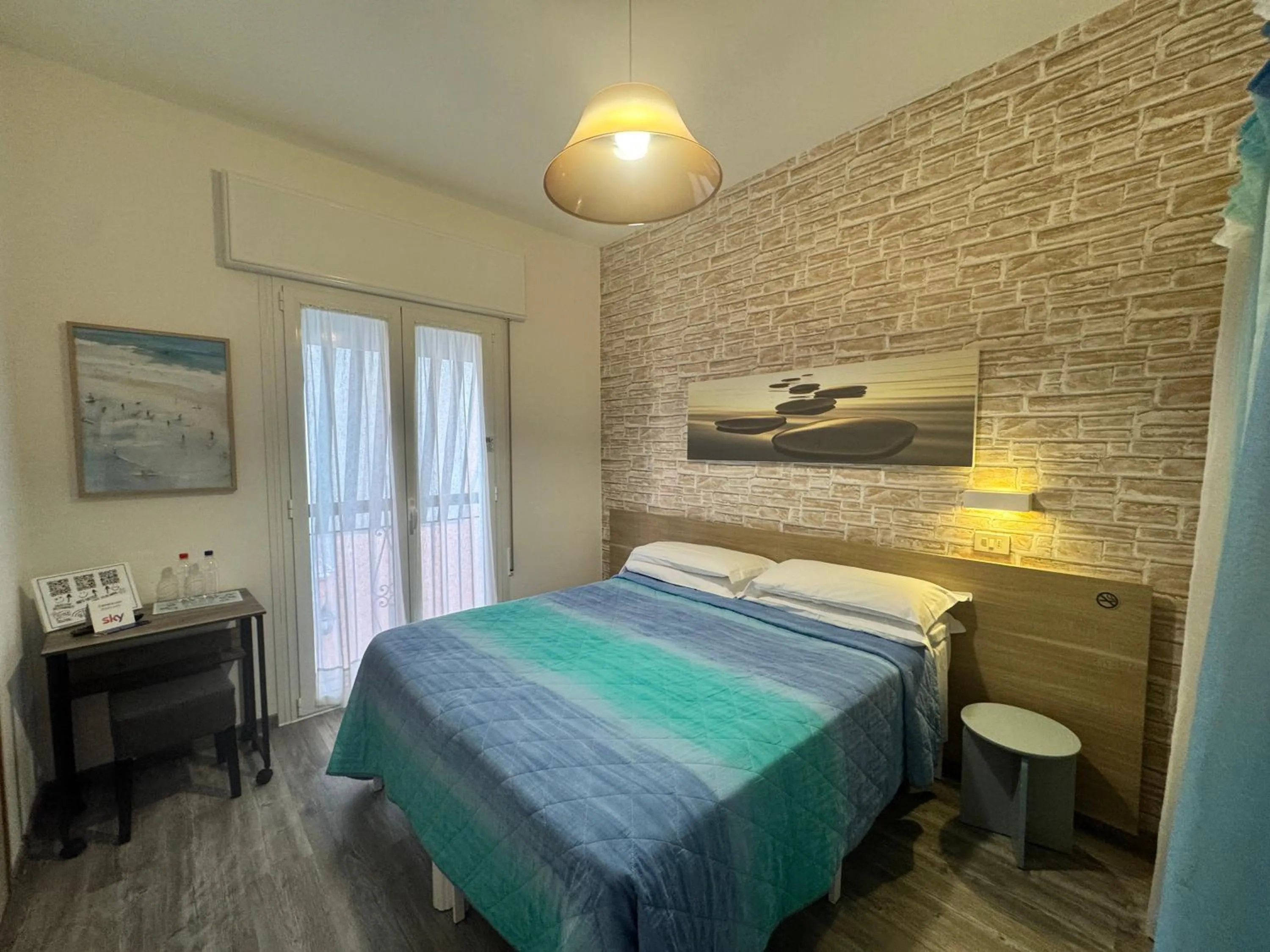 Photo of the whole room, Bed in Regina Urban Beach Hotel