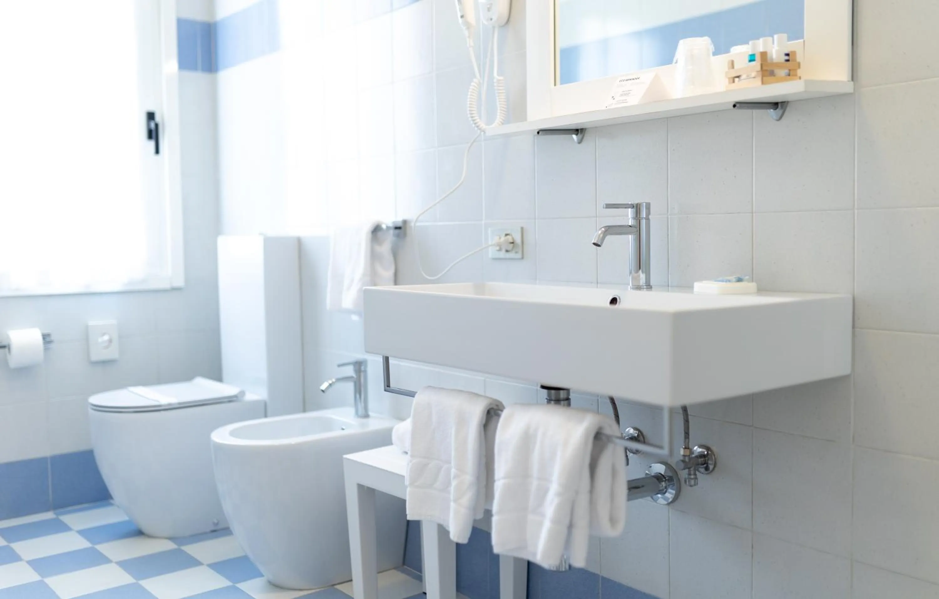 Toilet in Regina Urban Beach Hotel