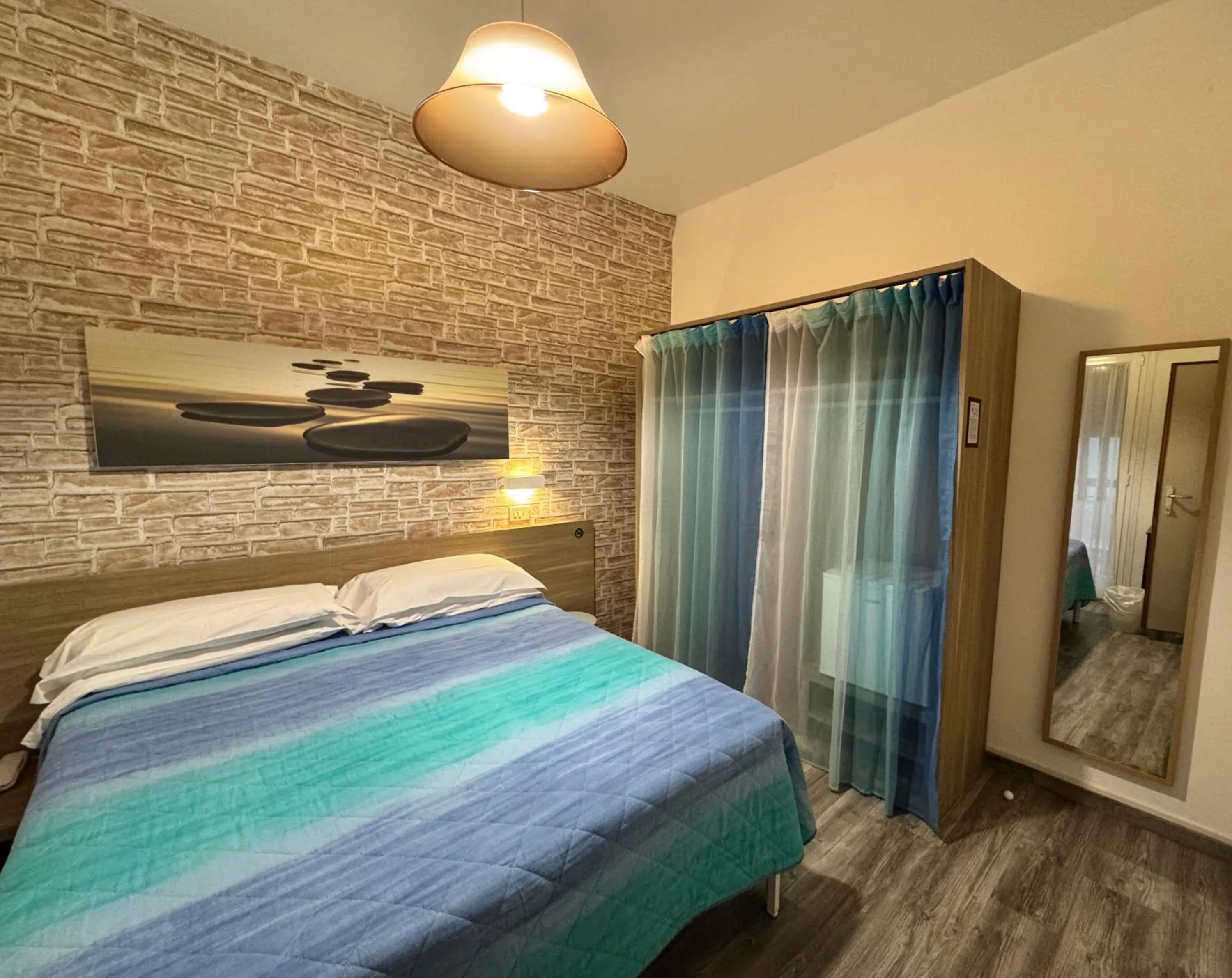 Photo of the whole room, Bed in Regina Urban Beach Hotel