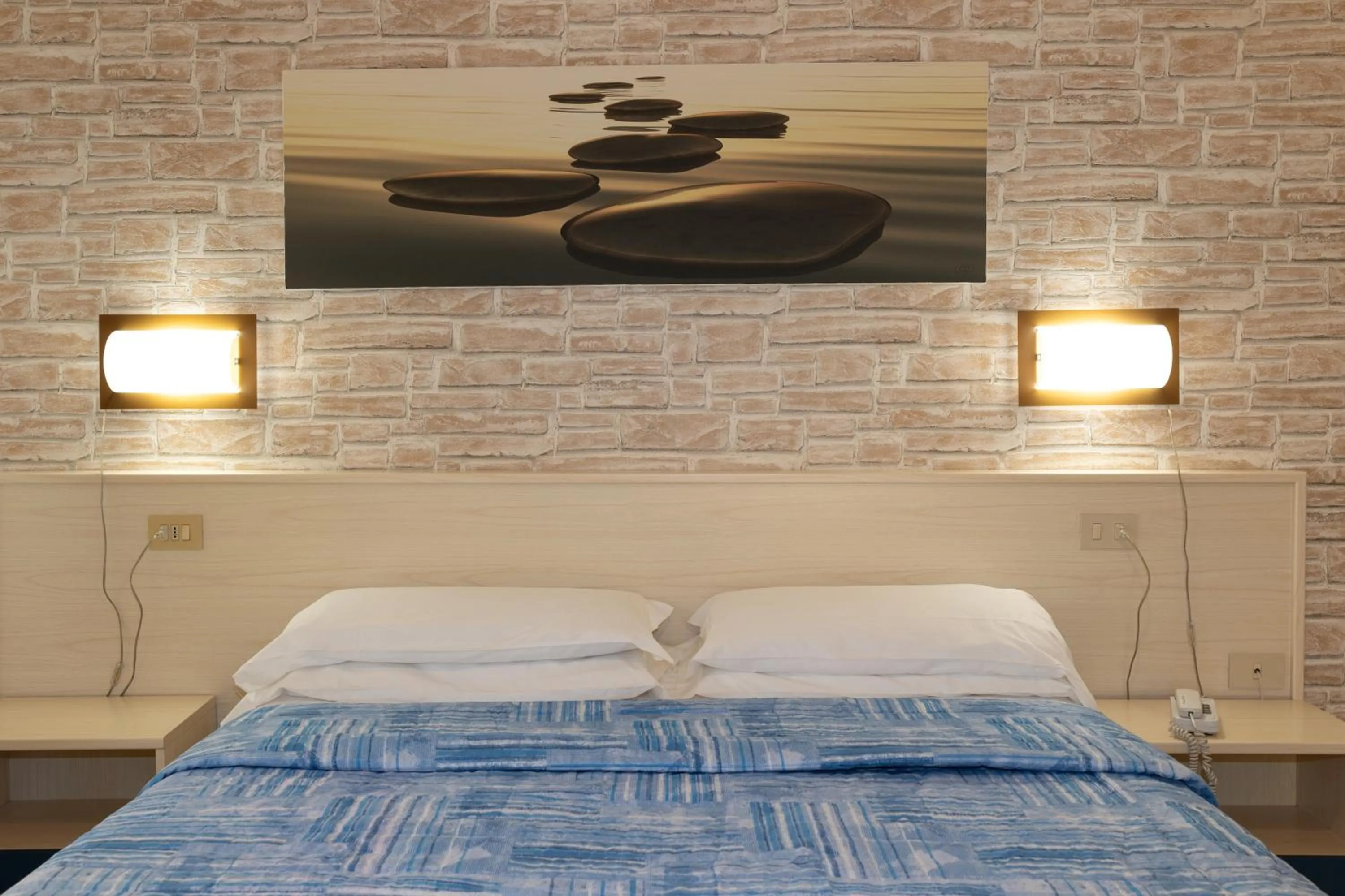 Bed in Regina Urban Beach Hotel