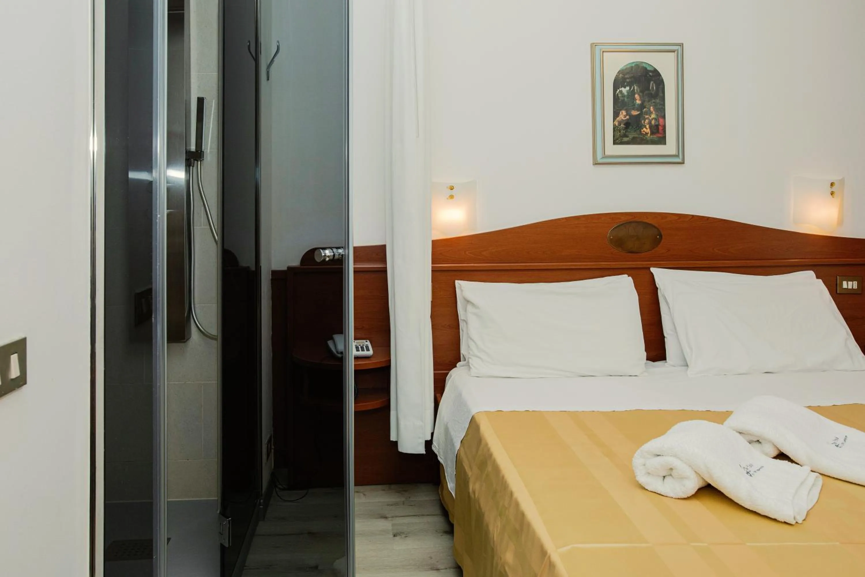 Bed in Hotel Leonardo Da Vinci Wellness SPA