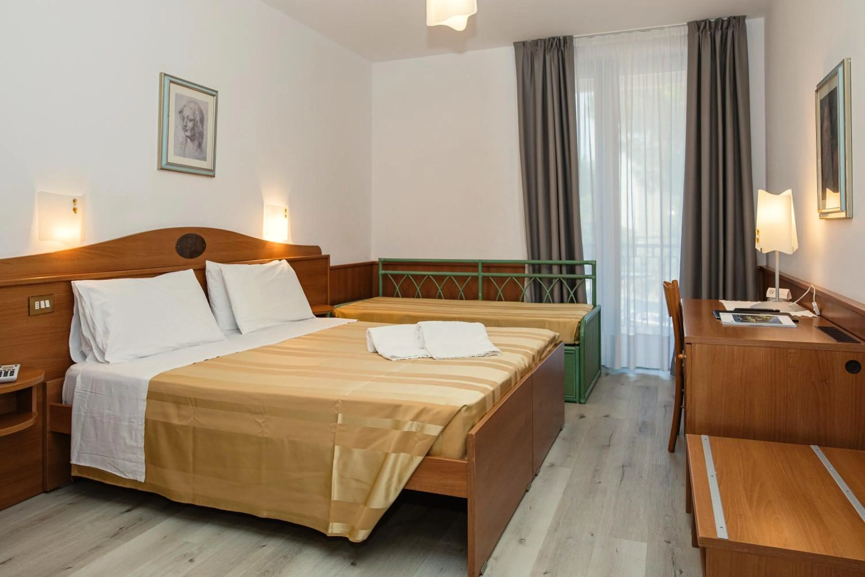 Bed in Hotel Leonardo Da Vinci Wellness SPA