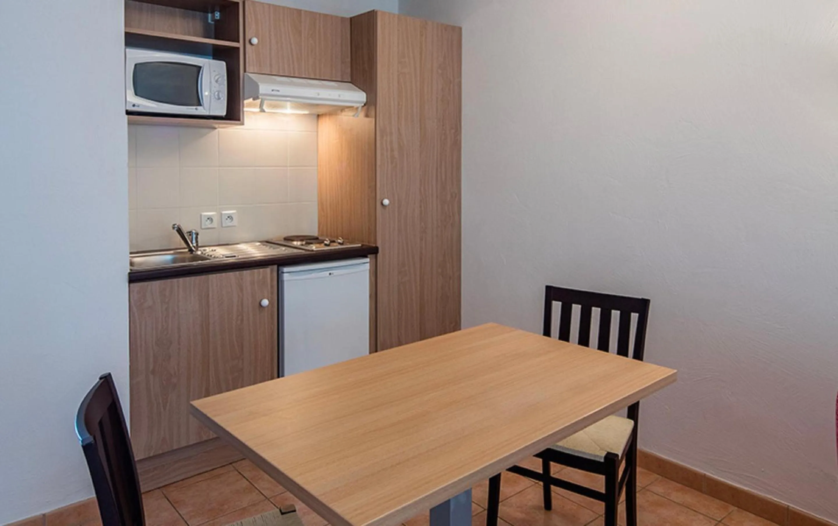 Kitchen or kitchenette in Vacancéole - Le Domaine du Golf d'Albret