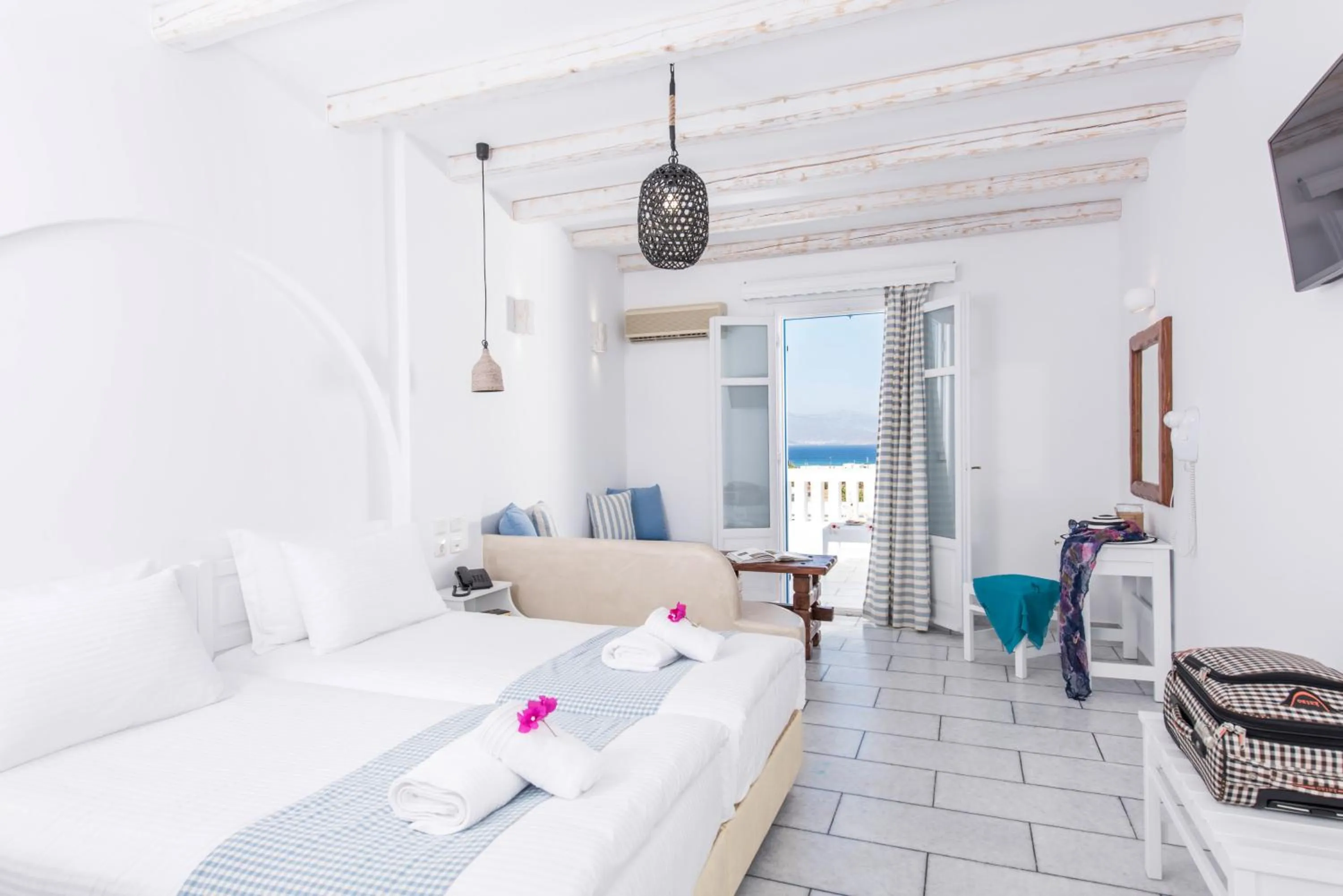 Photo of the whole room, Bed in Cycladic Islands Hotel & Spa