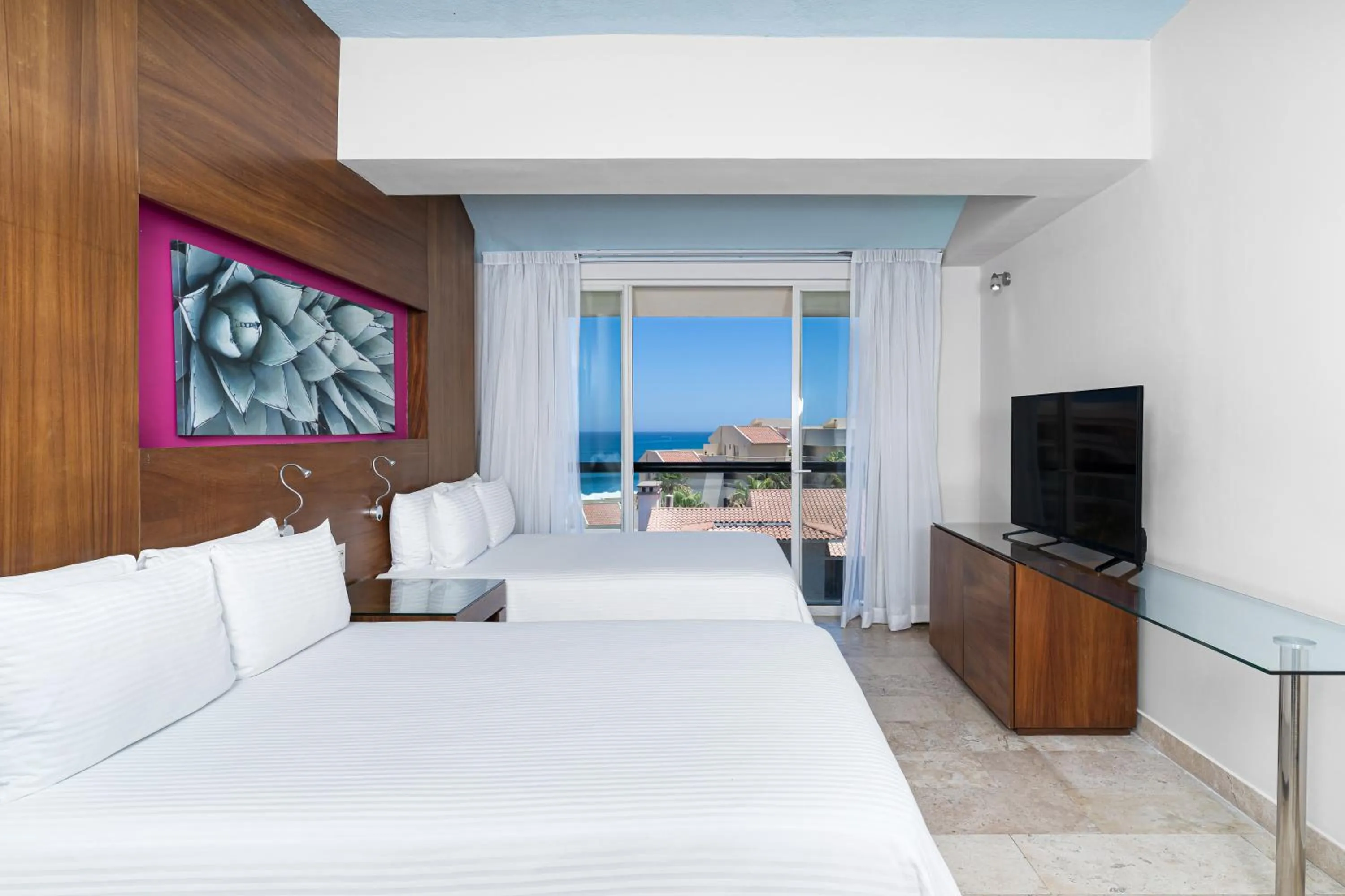 Communal lounge/ TV room, Bed in Krystal Grand Los Cabos - All Inclusive