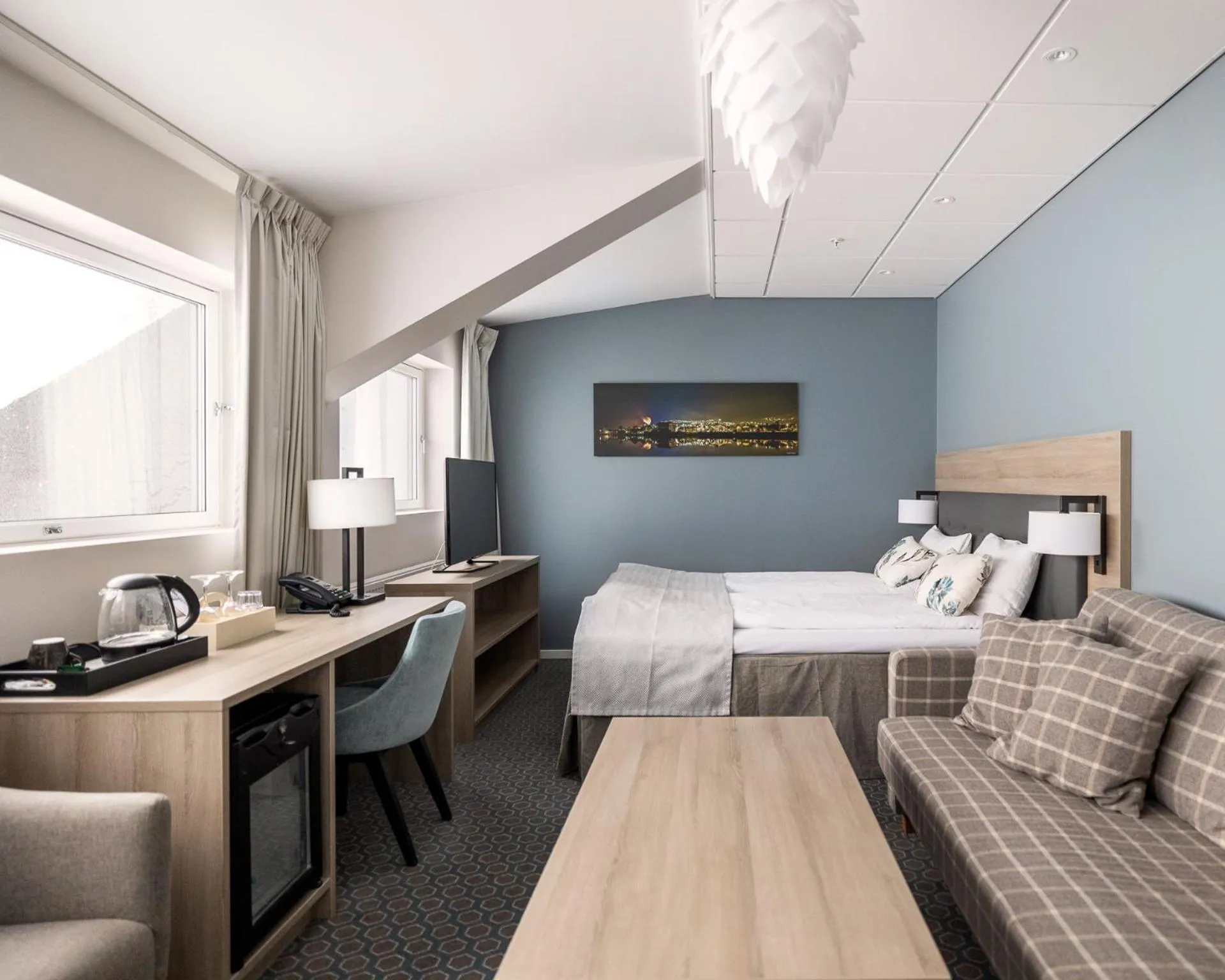 Seating area, Bed in Fru Haugans Hotel