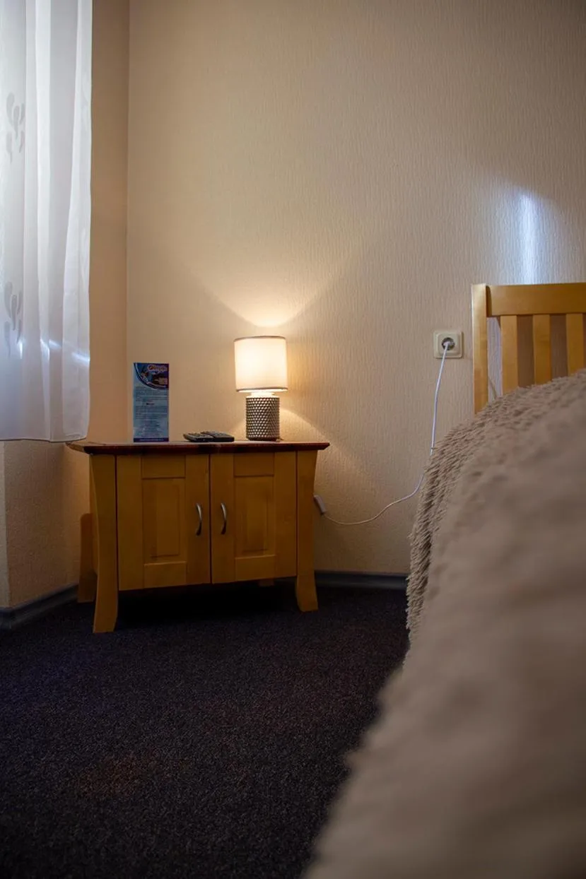 Photo of the whole room, Bed in Olimpija Hotel & SPA