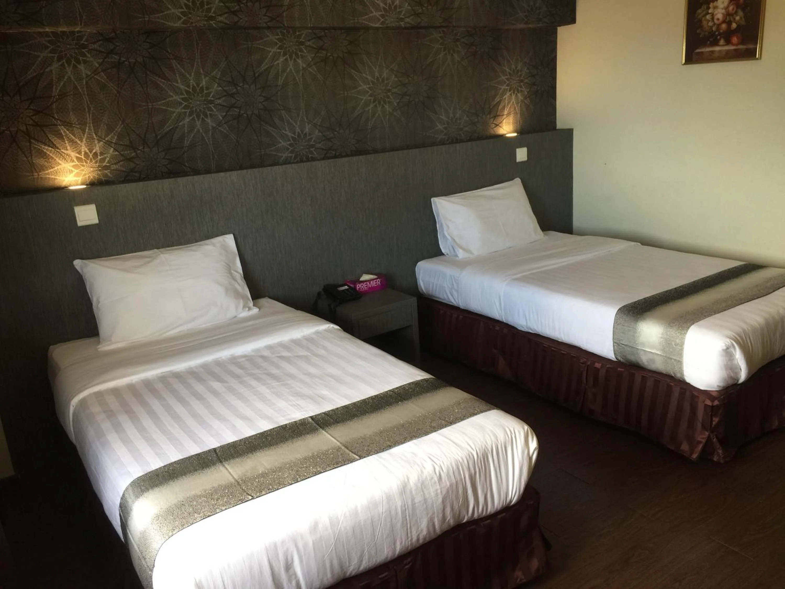 Bed in Check Inn Hotel Tawau