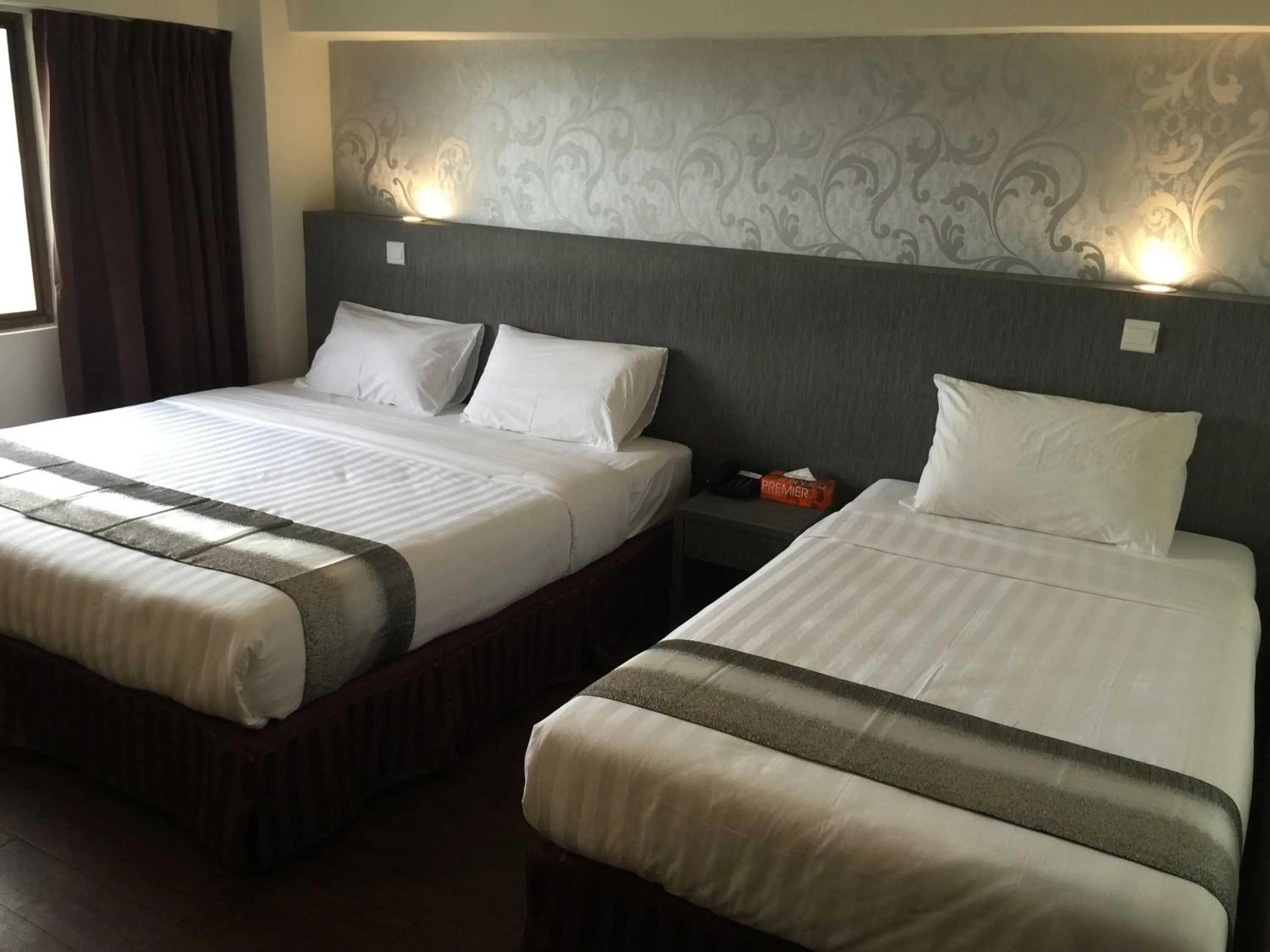 Bed in Check Inn Hotel Tawau