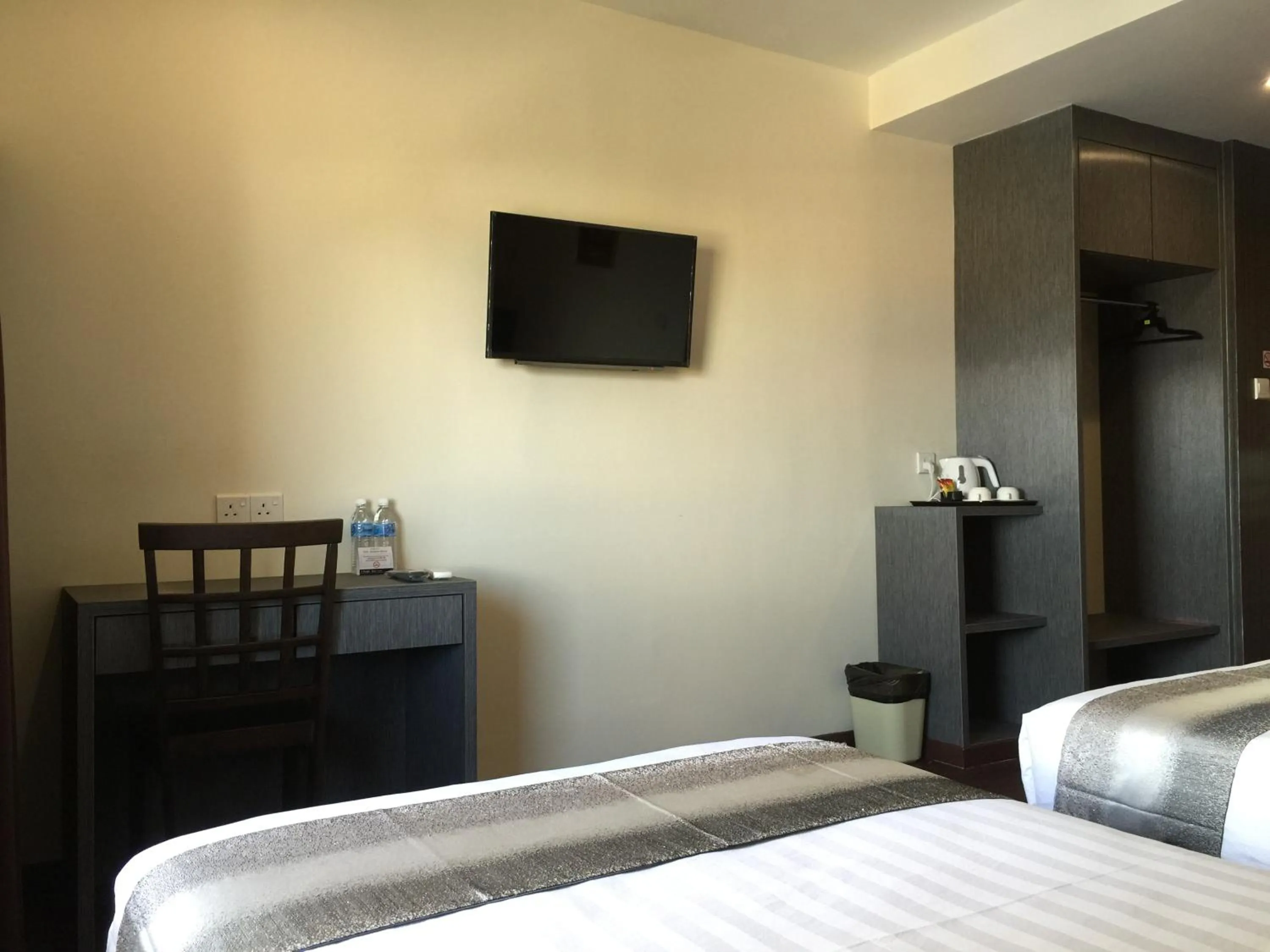 Bed in Check Inn Hotel Tawau