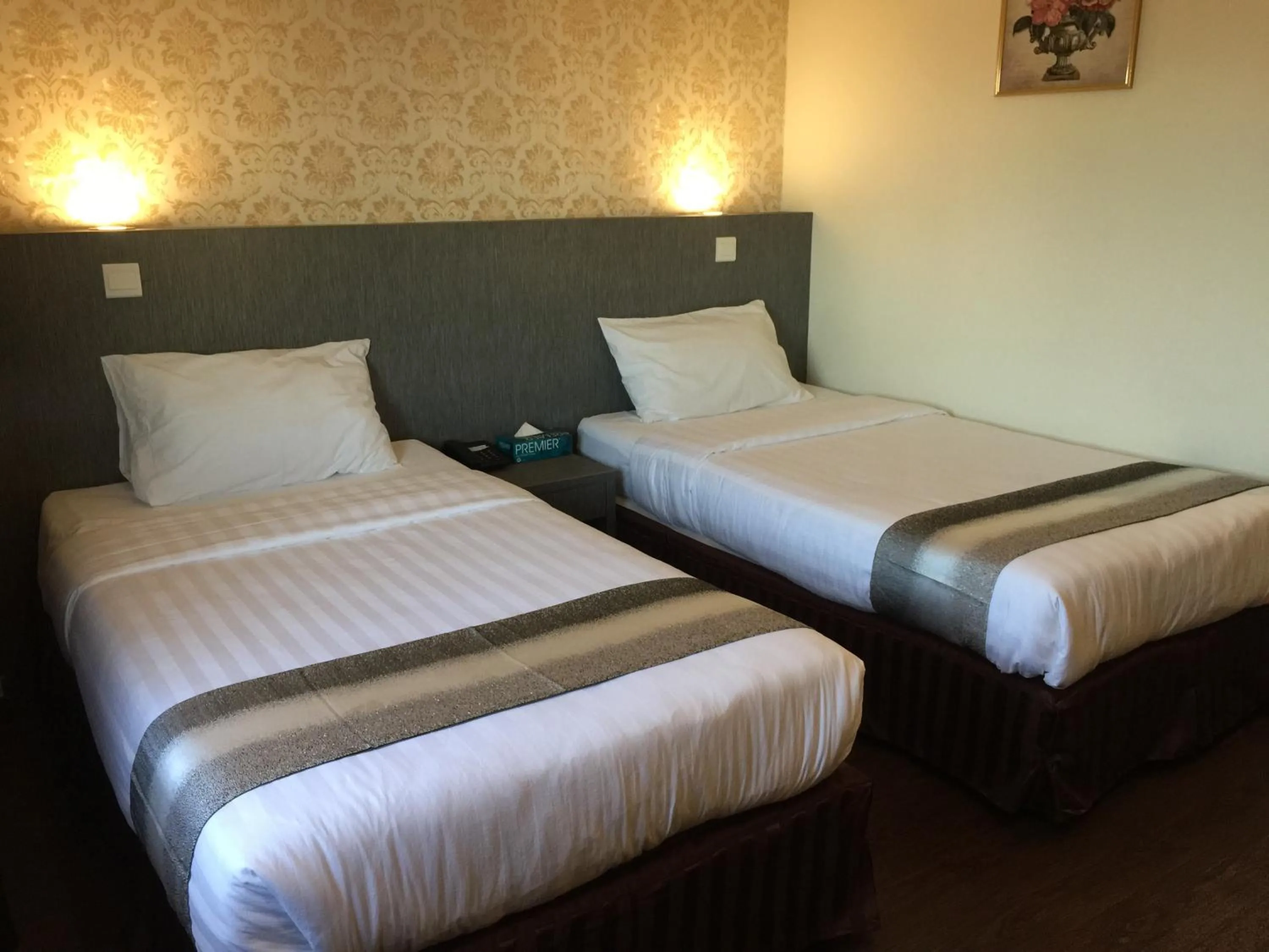 Bed in Check Inn Hotel Tawau