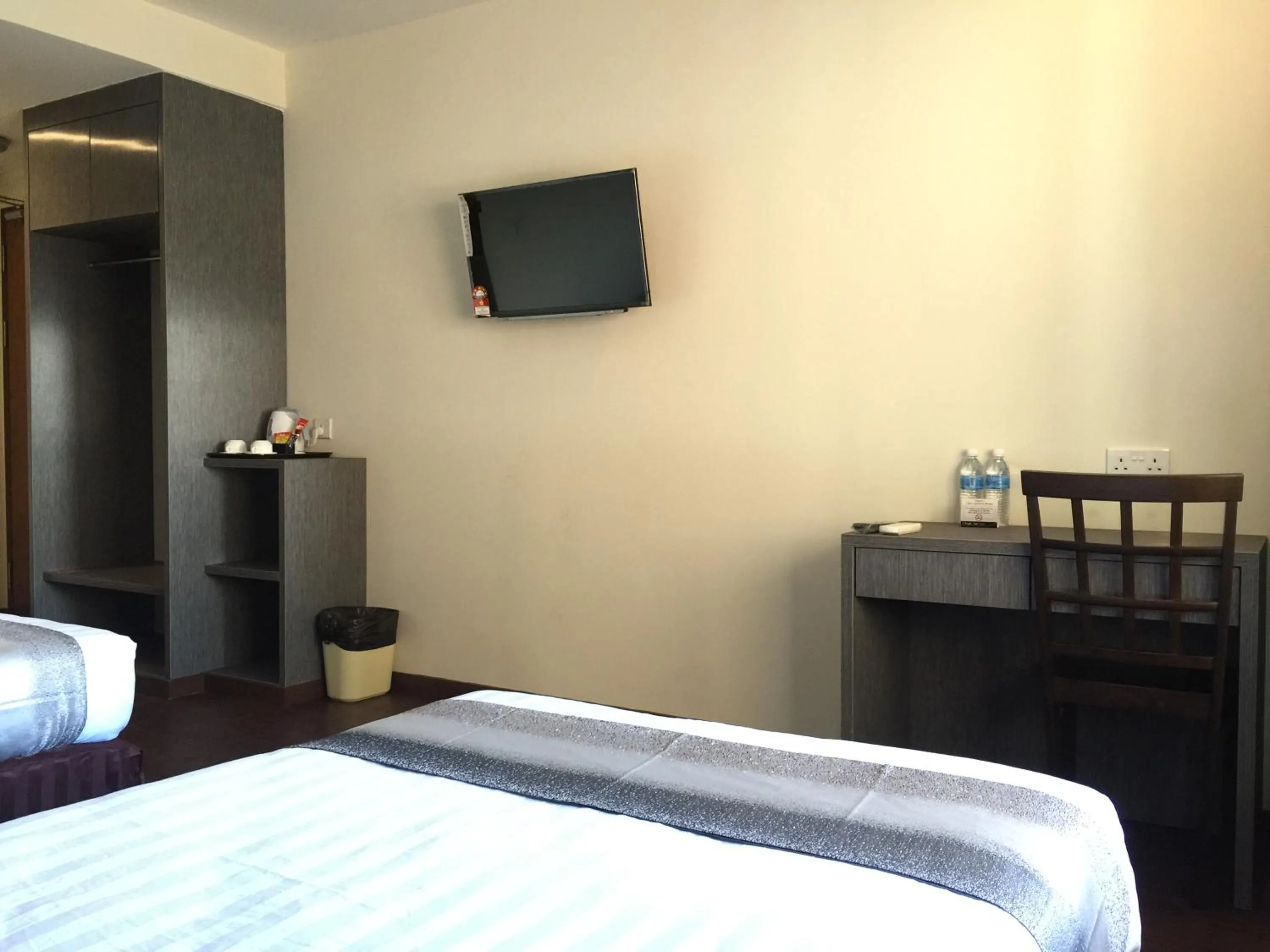 Bed in Check Inn Hotel Tawau