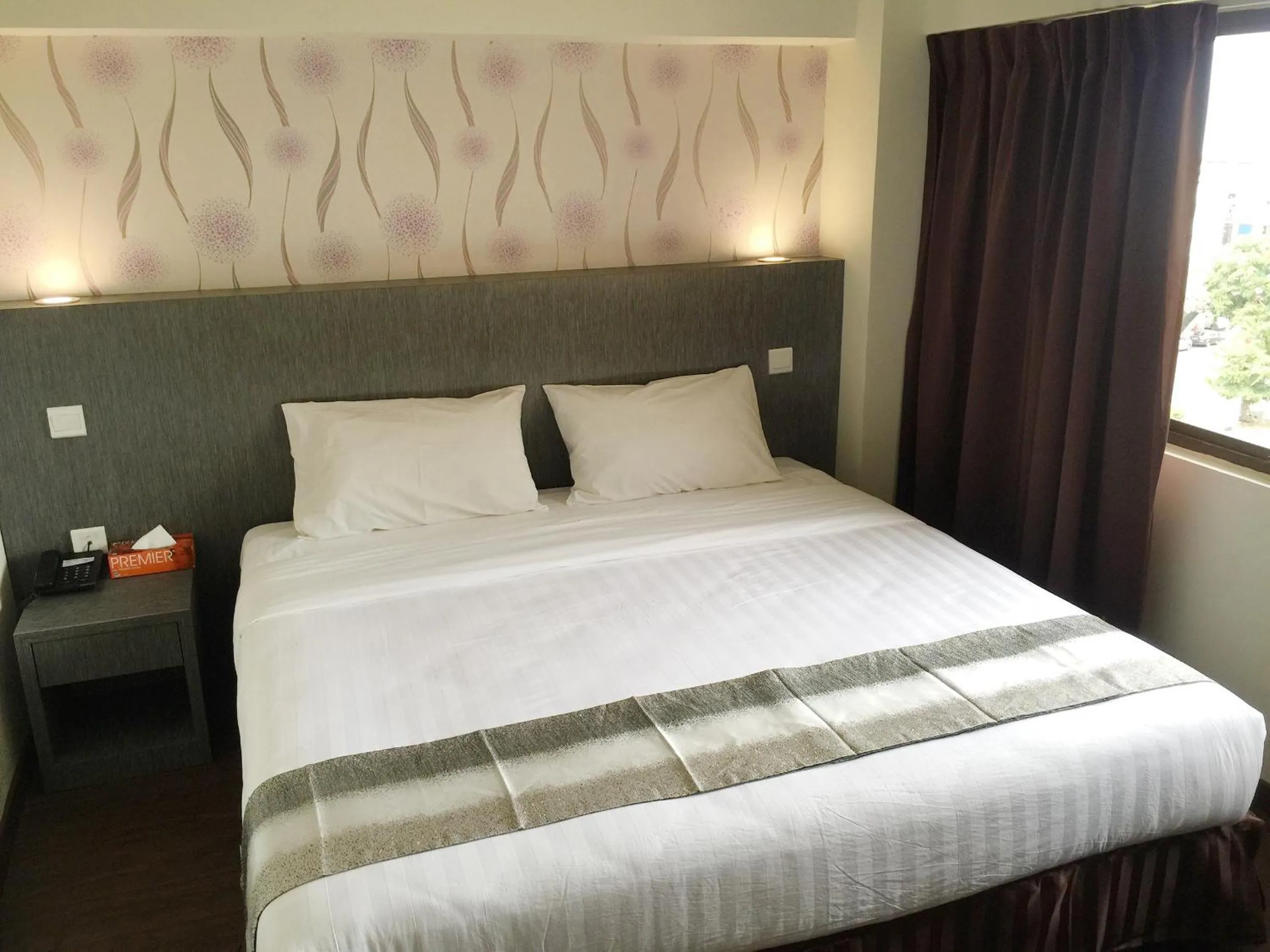 Bed in Check Inn Hotel Tawau