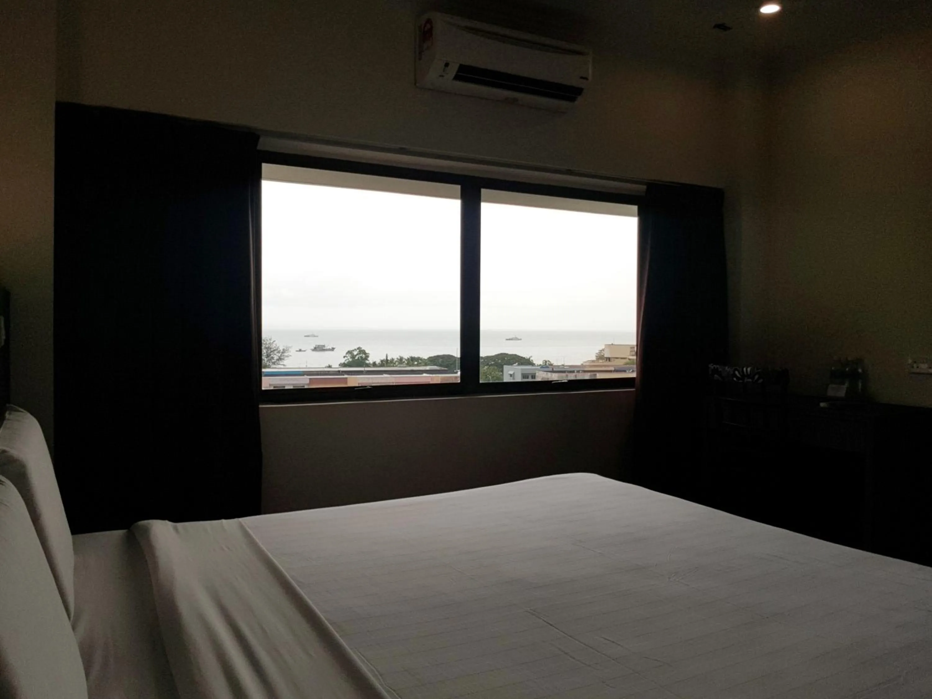 Bed in Check Inn Hotel Tawau