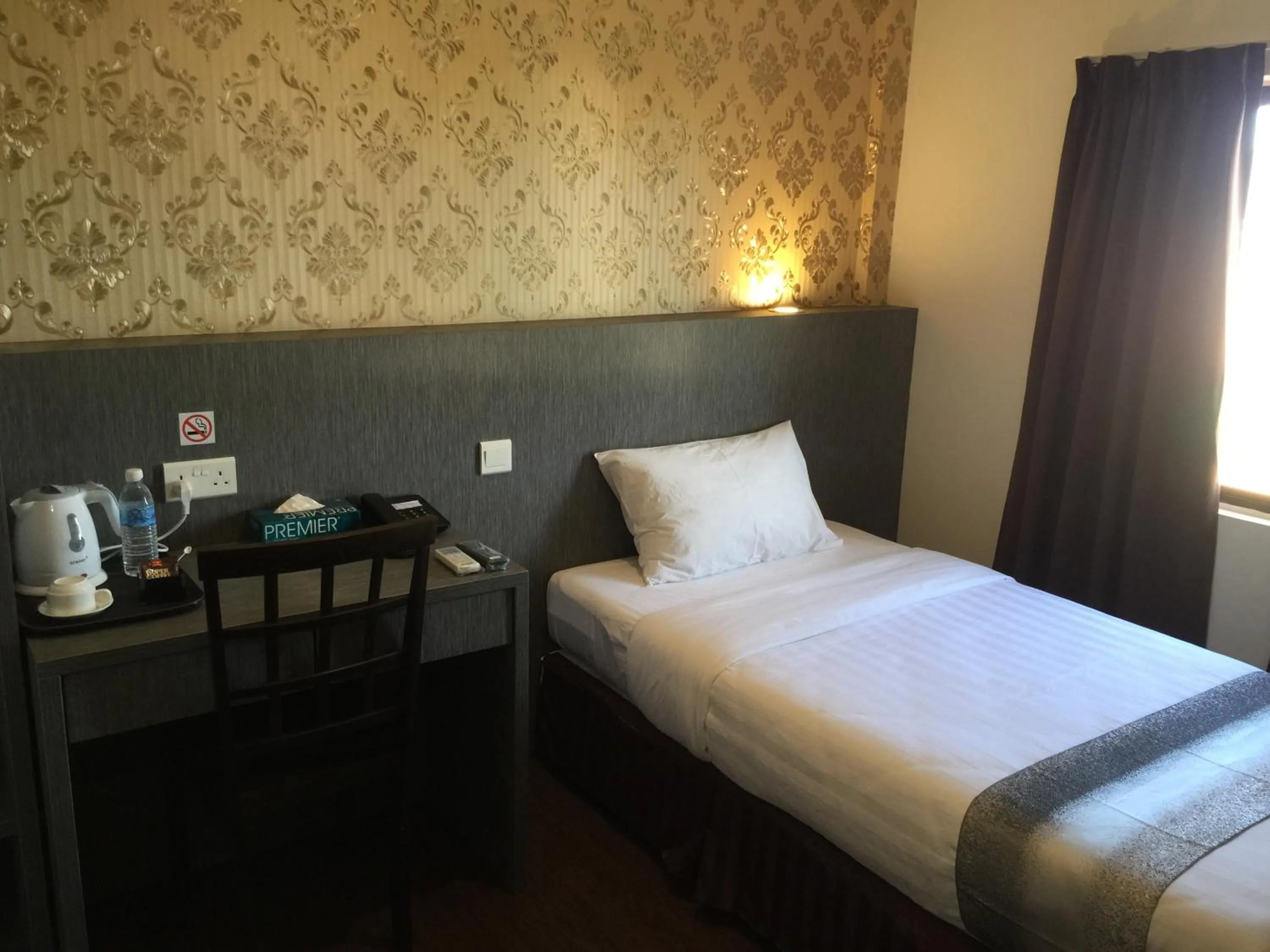 Bed in Check Inn Hotel Tawau