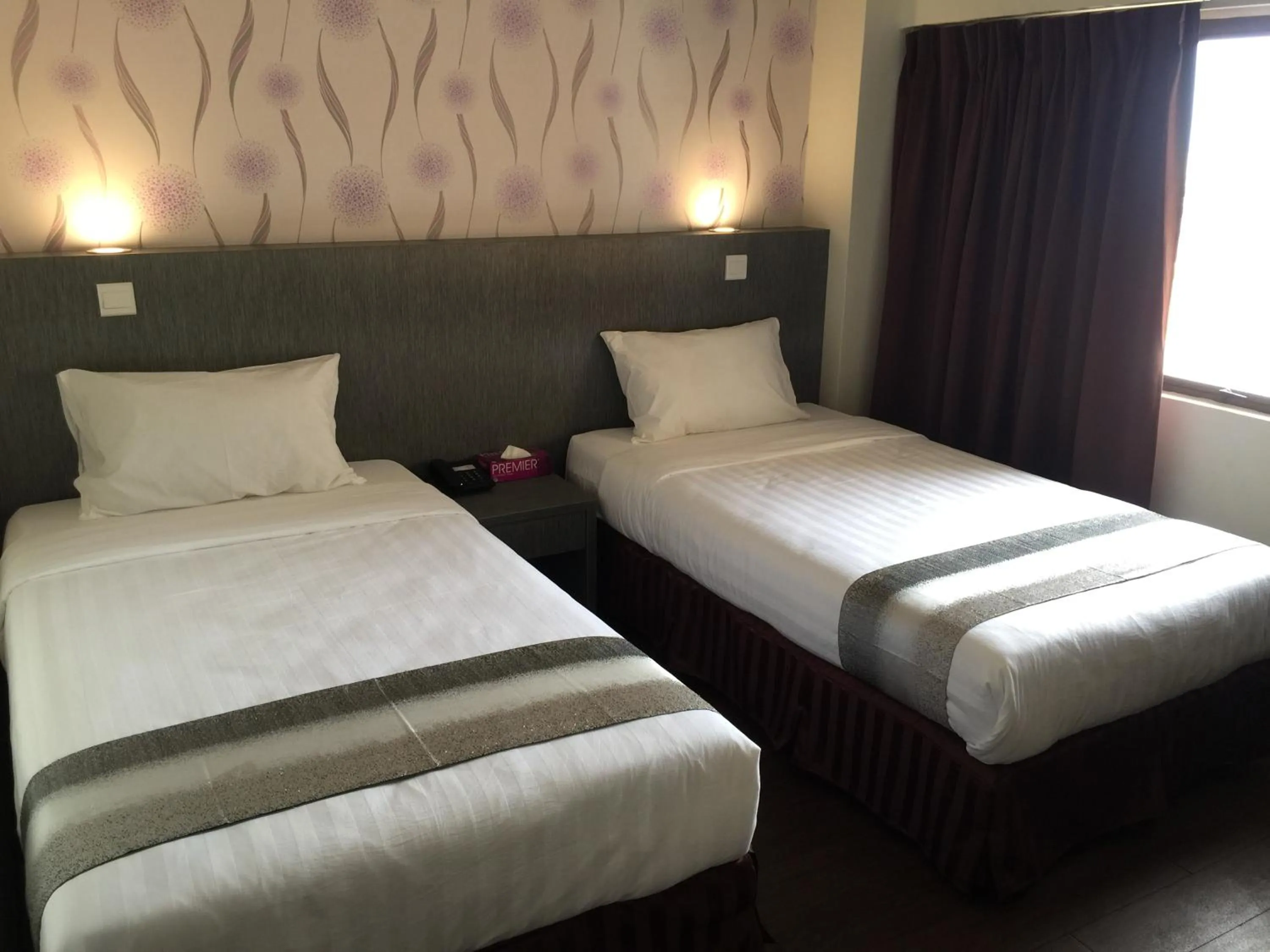 Bed in Check Inn Hotel Tawau