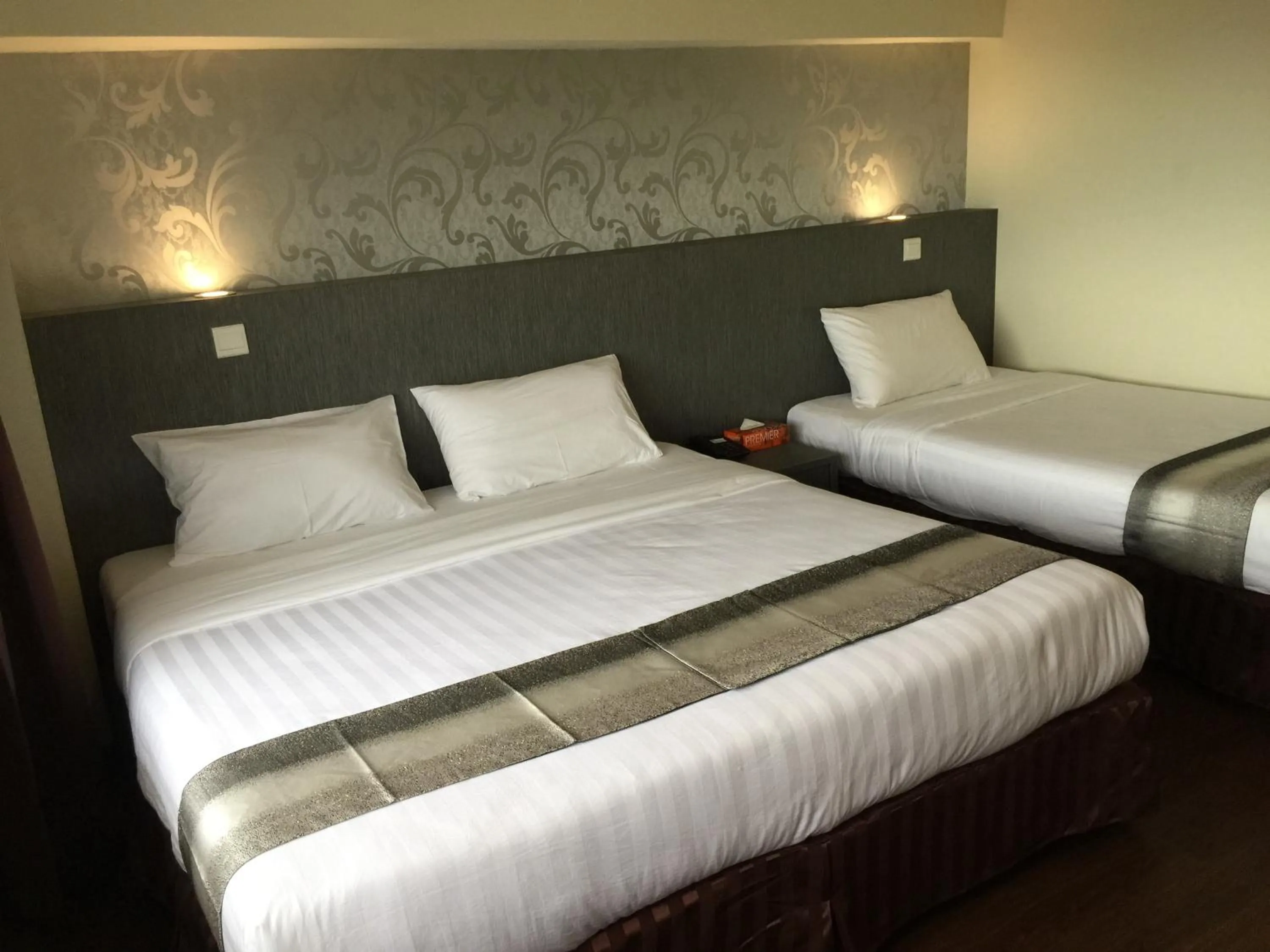 Bed in Check Inn Hotel Tawau