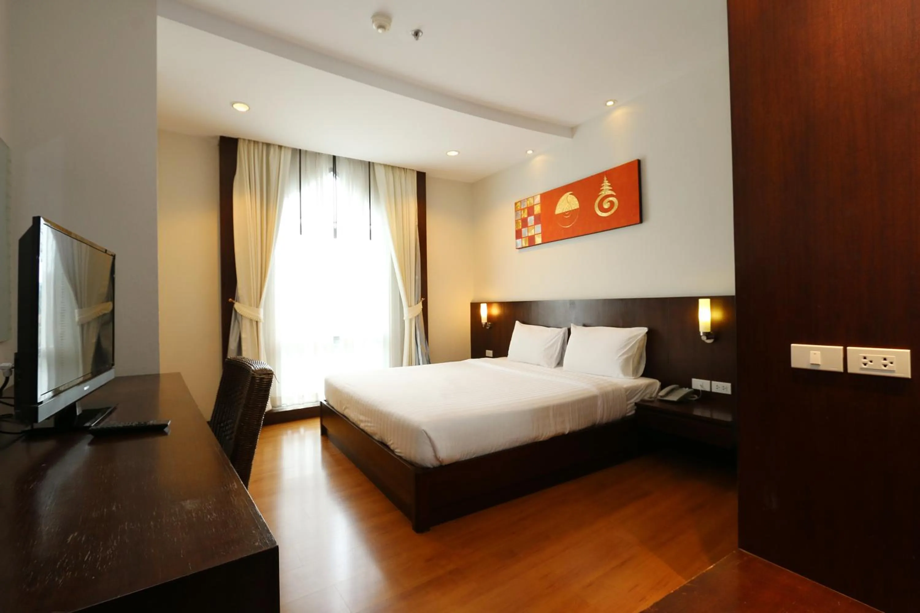 Photo of the whole room, Bed in Grande Southern Hotel