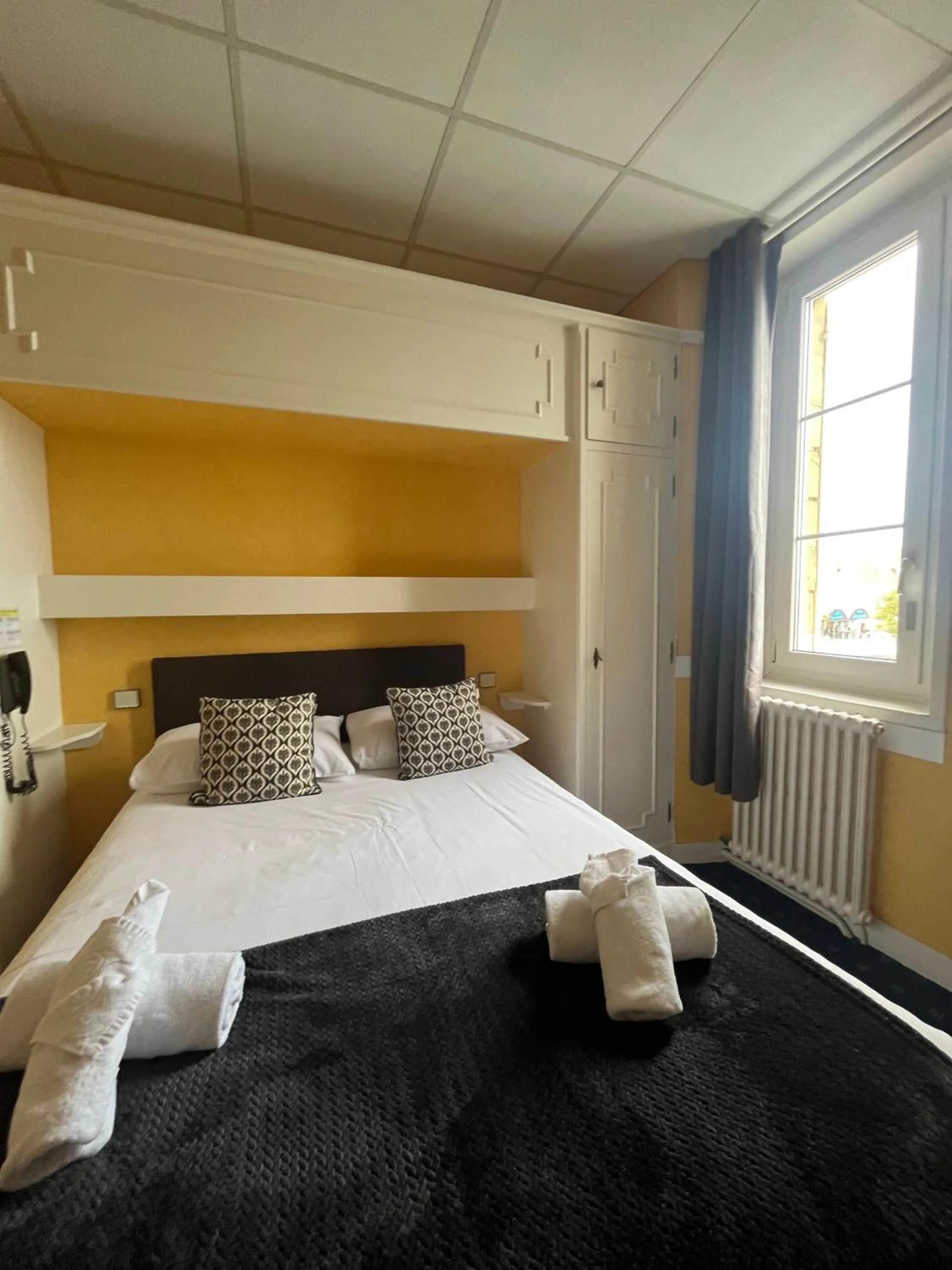 Photo of the whole room, Bed in Hôtel Le Phare