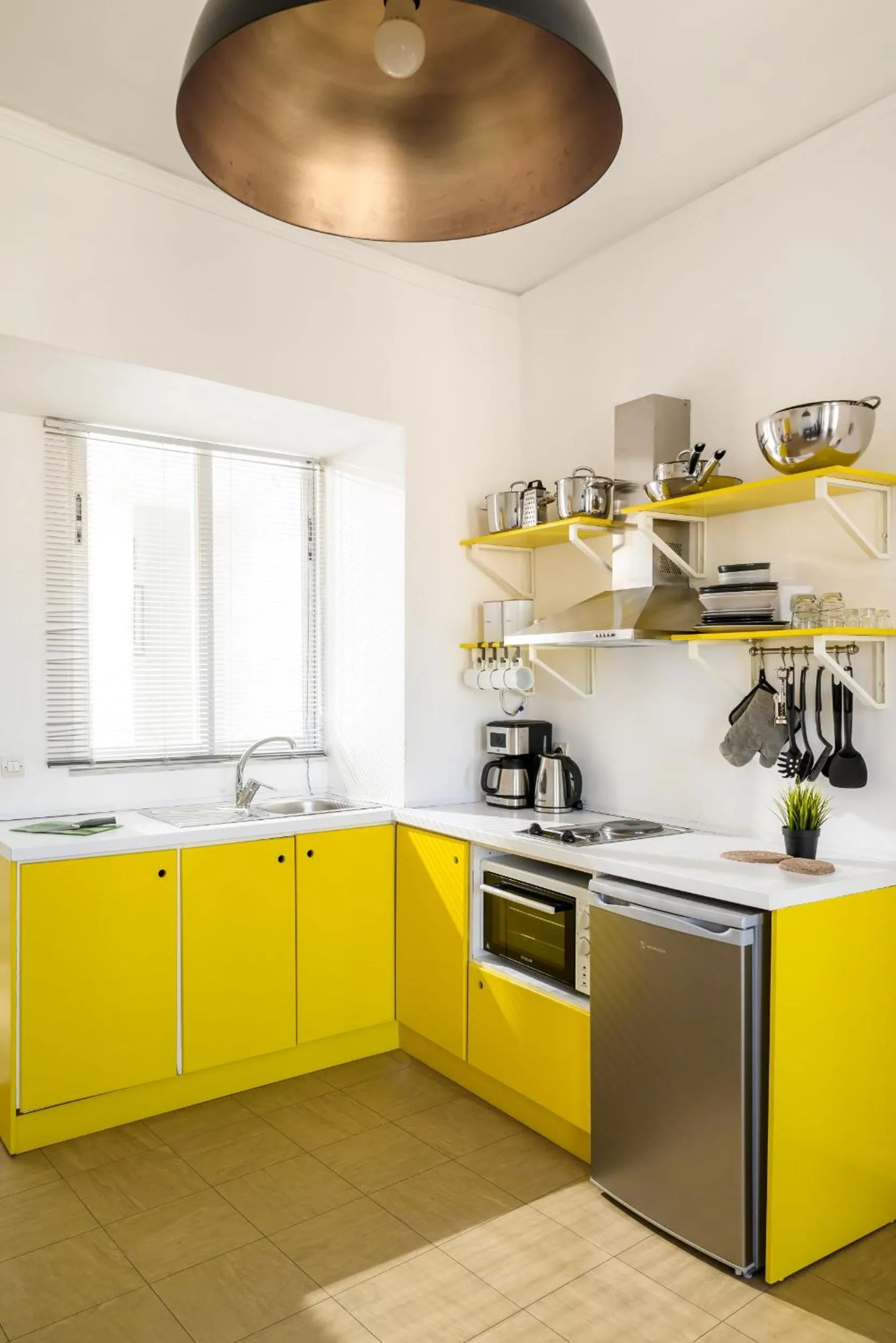 Kitchen or kitchenette in Crops Suites