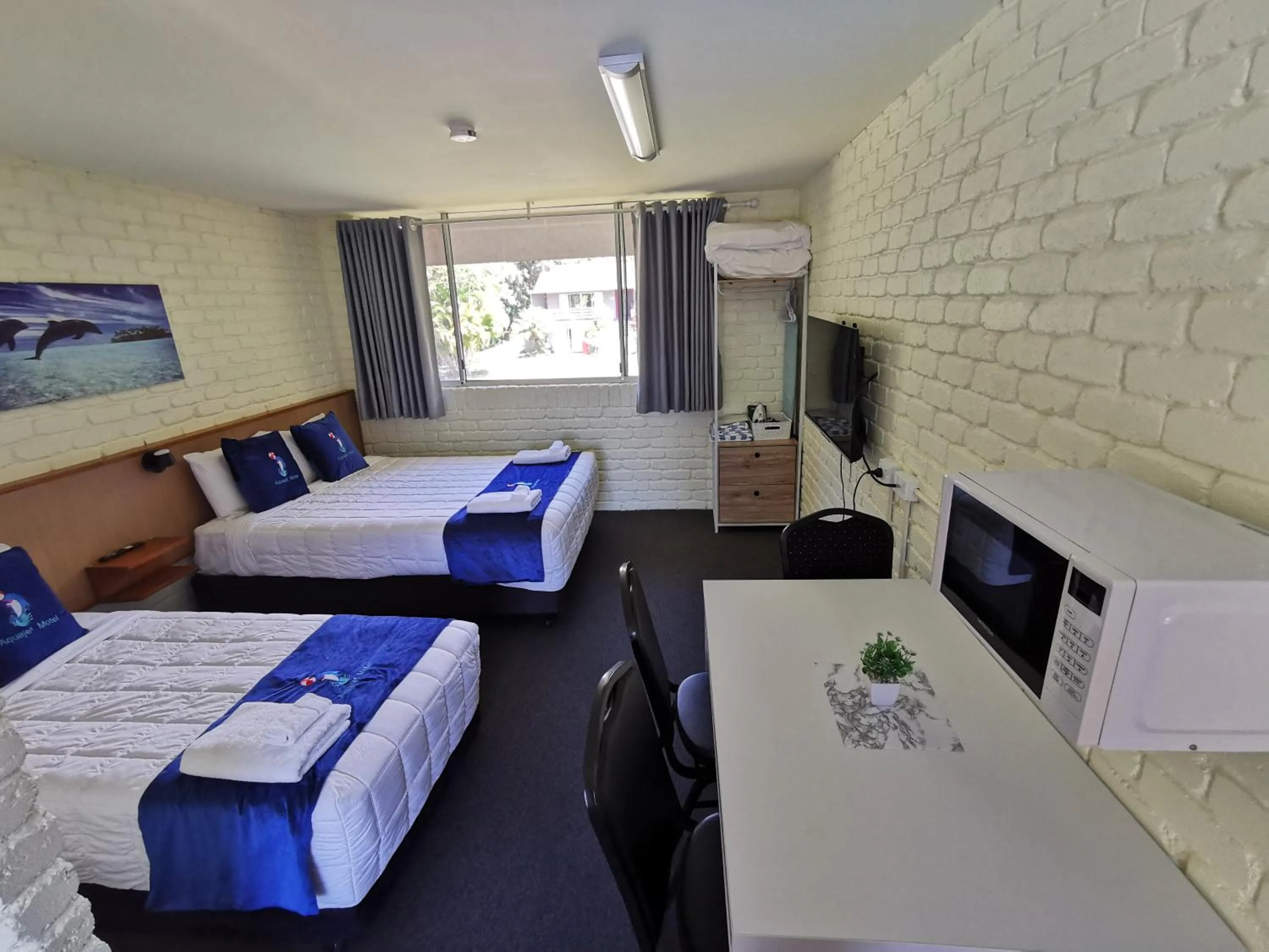 Bed in Aquajet Motel